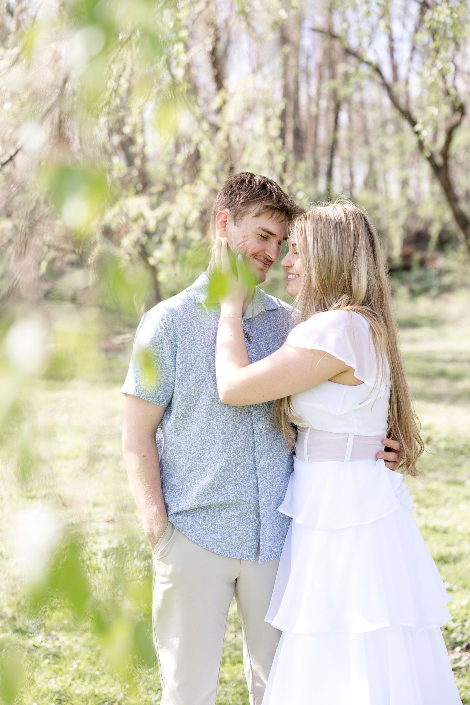 Cincinnati engagement session at Ault Park with light and airy style, capturing joyful, natural moments in a spring park setting