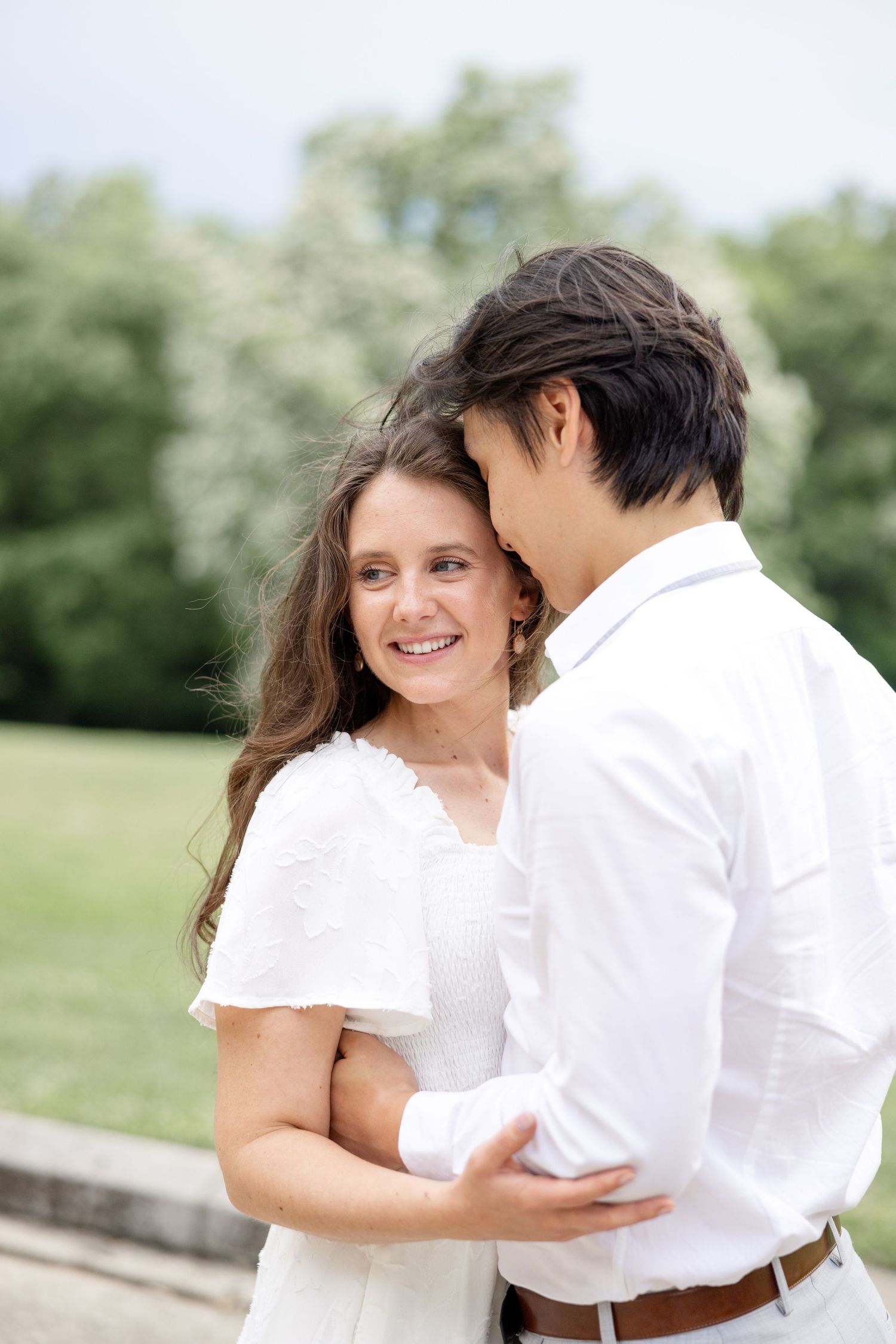 Romantic engagement photos at Mt. Echo Park overlooking the Cincinnati skyline in Cincinnati, Ohio by Julia and Sean Photography