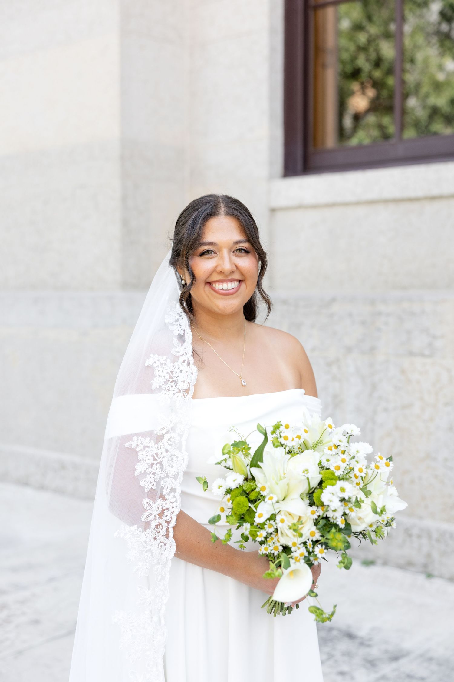 Bride and groom celebrating their Flat 51 wedding in downtown Columbus, Ohio, captured with timeless, light and airy wedding photography.