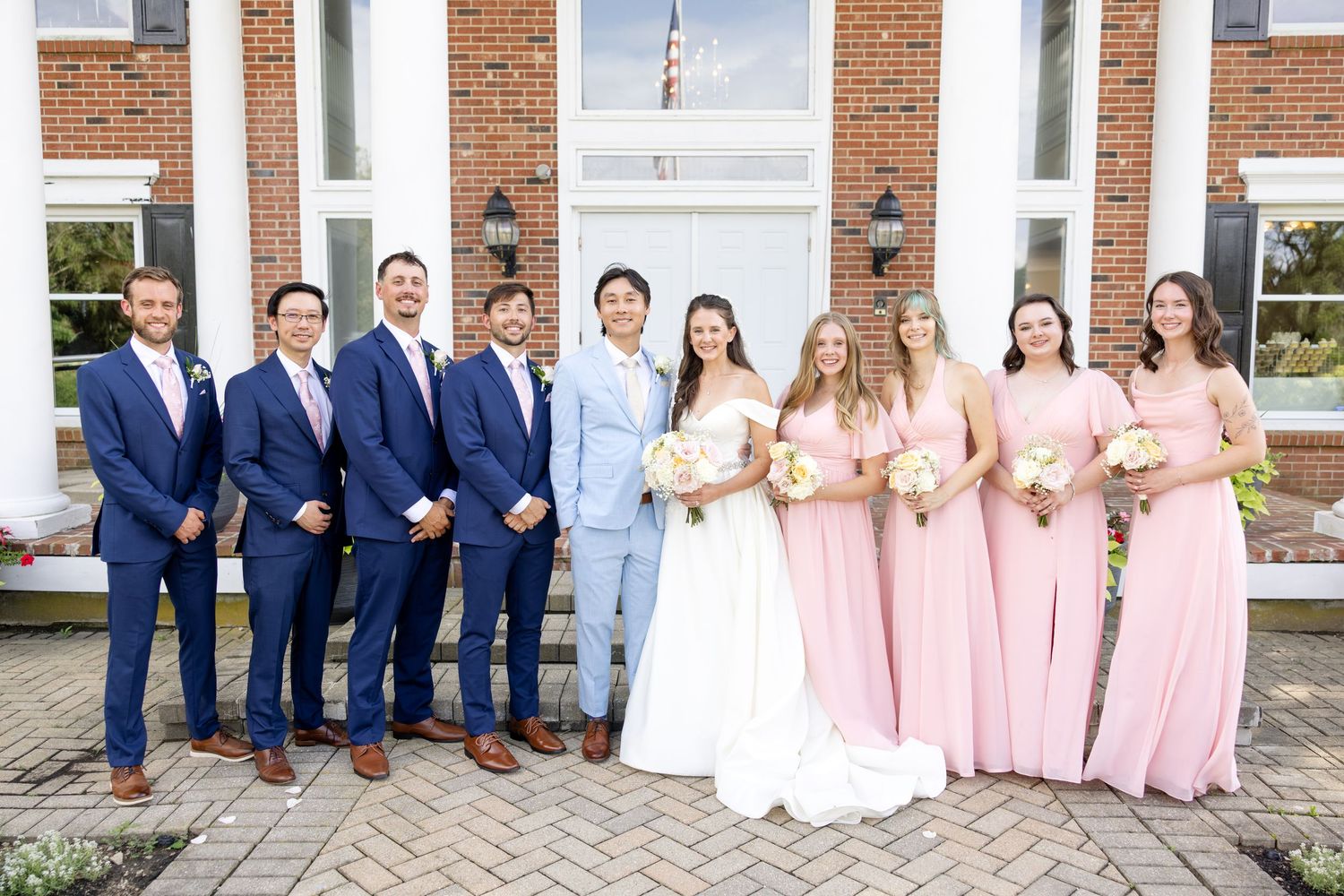 Light and airy wedding photography of a newly married couple at The Estate at Sunset Farm in Bellbrook, Ohio, by Julia and Sean Photography