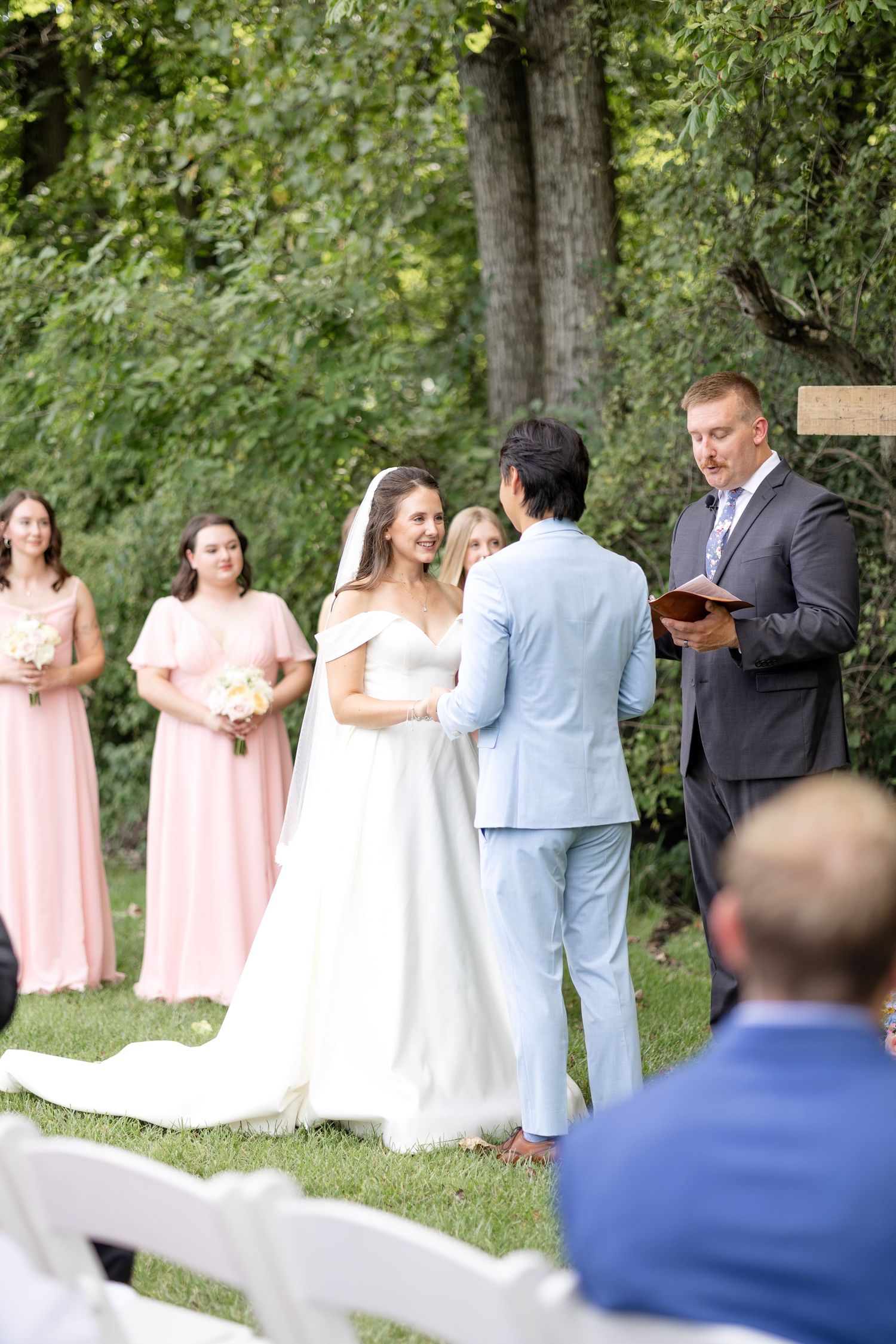 Outdoor wedding ceremony at The Estate at Sunset Farm in Bellbrook, Ohio, captured by Dayton wedding photographers Julia & Sean Photography
