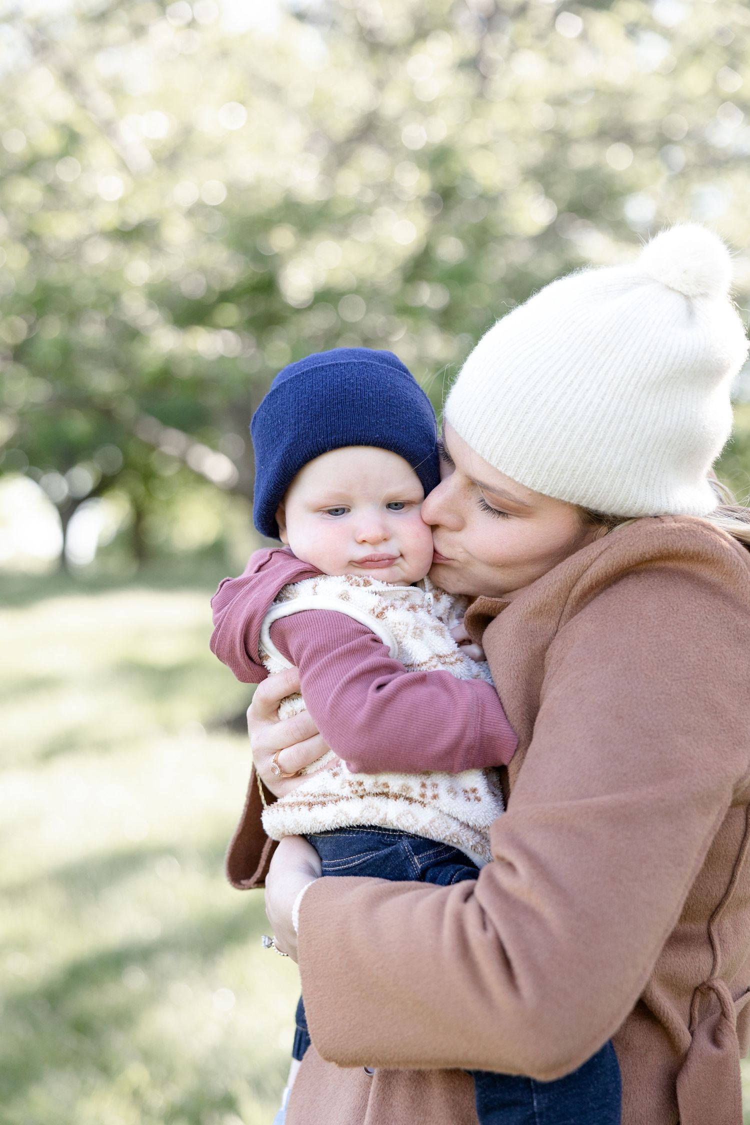 Joyful motherhood photos at Carillon Park in Dayton Ohio captured by Julia and Sean Photography during a soft spring day