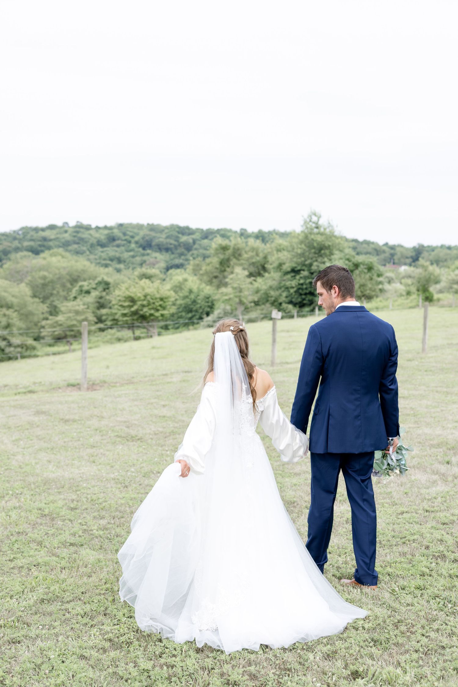 Romantic summer wedding in Northeast Ohio at Heartland on Heritage by Julia and Sean Photography, husband-and-wife wedding photographers.