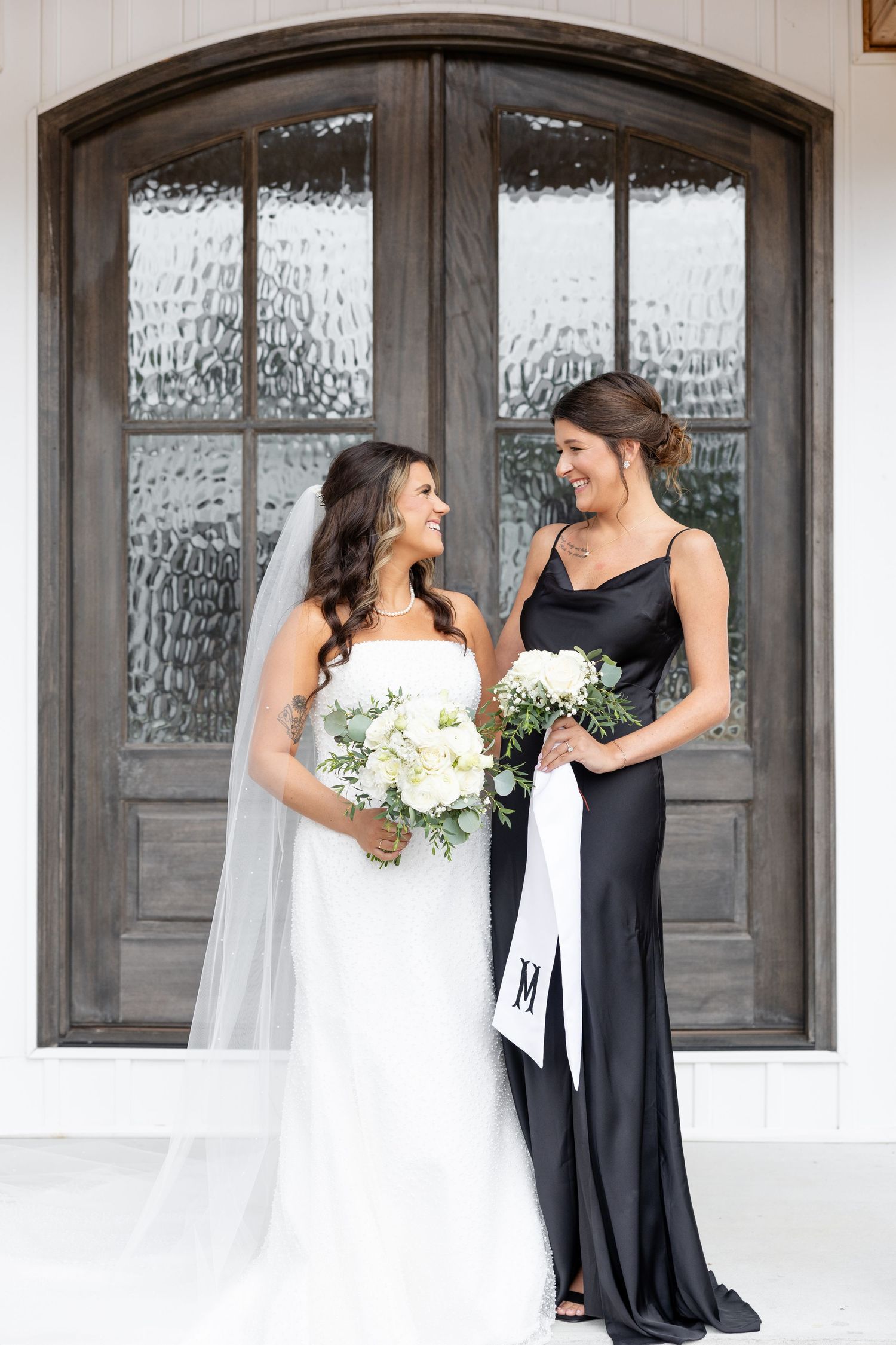 Elegant wedding at The Upton House in Guntersville, Alabama featuring a joyful bride and groom and timeless southern elegance.