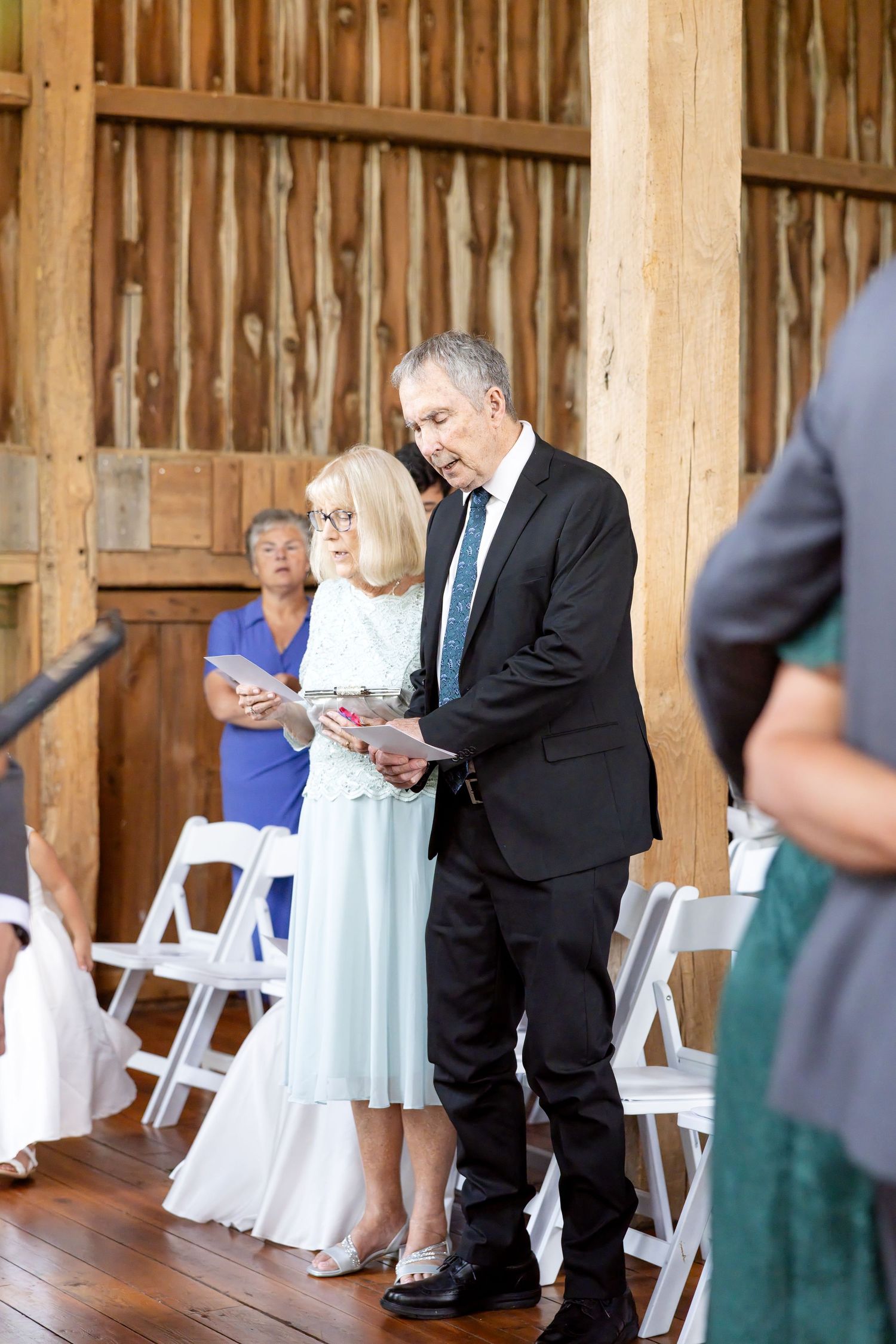 Timeless wedding photography at The Bicentennial Barn in Dayton, Ohio, featuring a joyful Cedarville University couple on their wedding day.