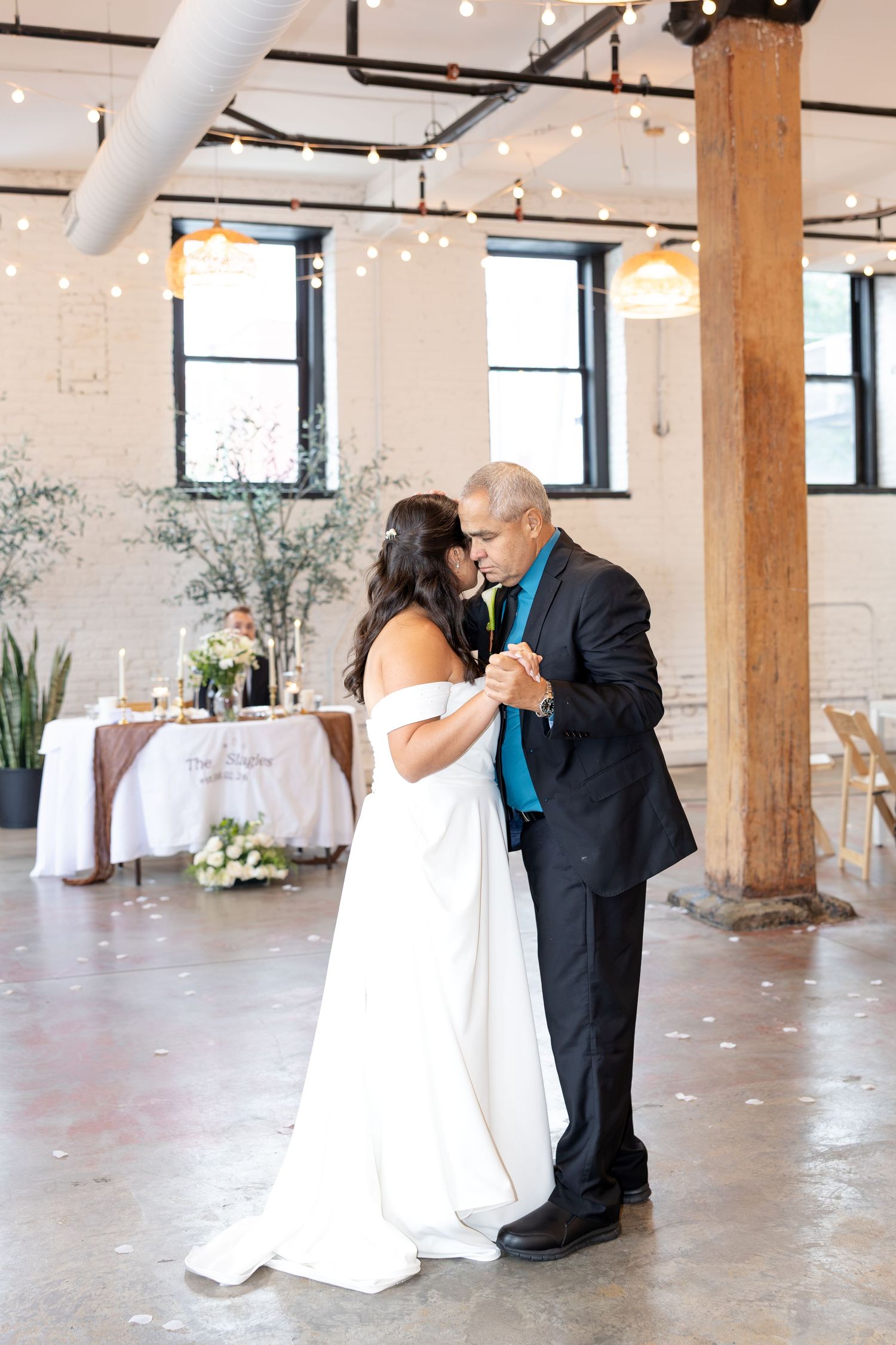 Wedding reception at Flat 51 in downtown Columbus, Ohio, featuring elegant reception details, heartfelt moments, and joyful celebration.