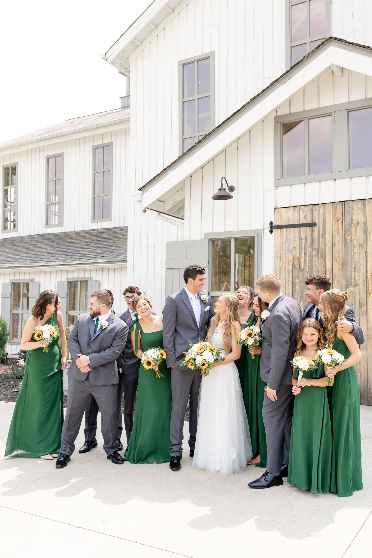 Joyful summer wedding at The Bicentennial Barn in Dayton, Ohio, photographed by Dayton wedding photographers Julia and Sean Photography.