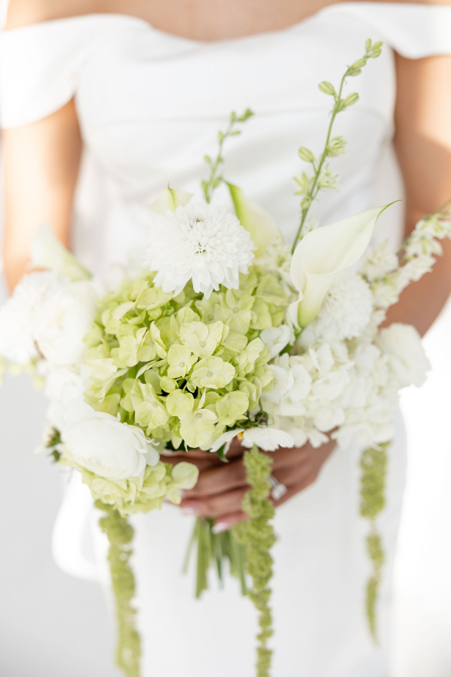 Light and airy wedding photos at The Glass House near Huntsville, Alabama capturing joyful, timeless moments of a bride and groom