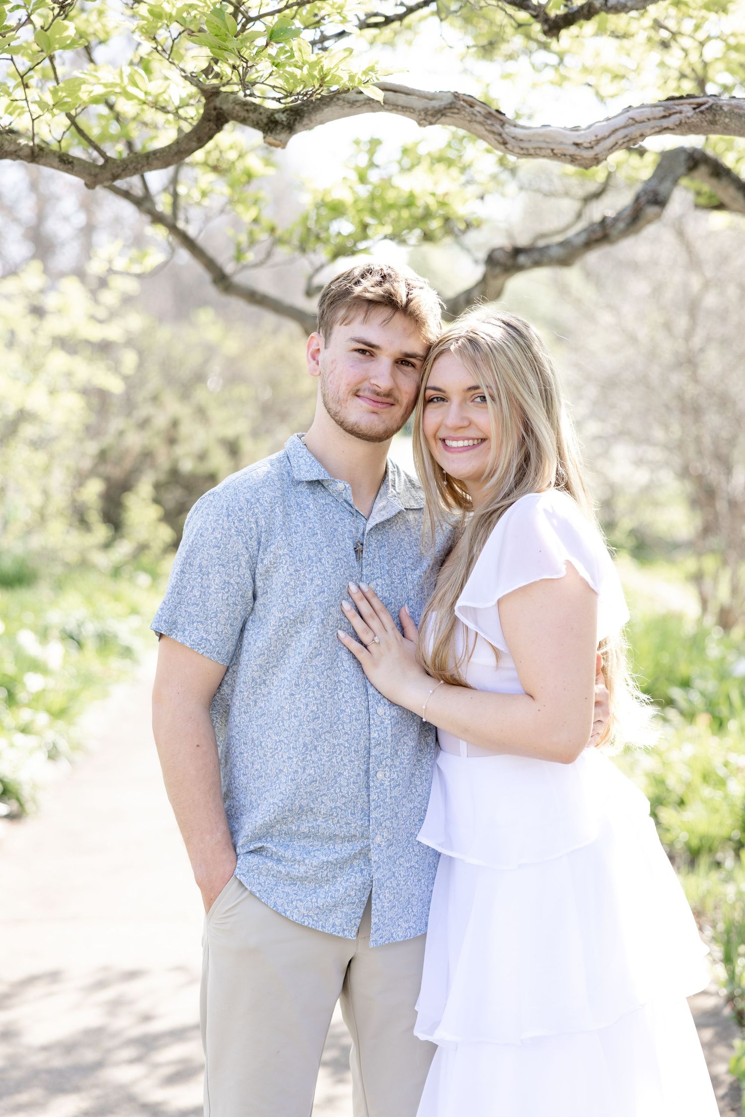 Cincinnati engagement session at Ault Park with light and airy style, capturing joyful, natural moments in a spring park setting