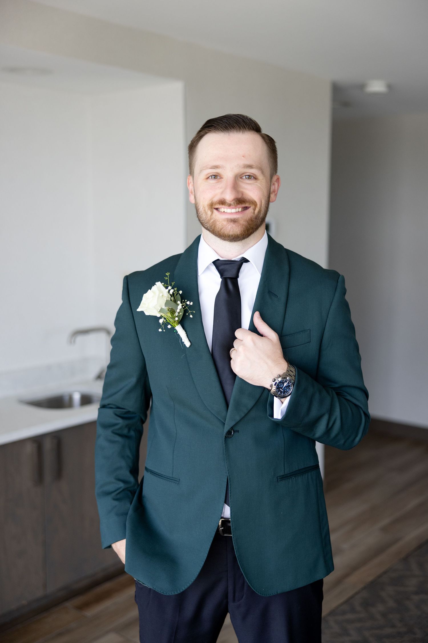 Getting ready photos at The Renaissance Hotel in downtown Toledo before a joyful Toledo Zoo wedding photographed by Julia & Sean Photography