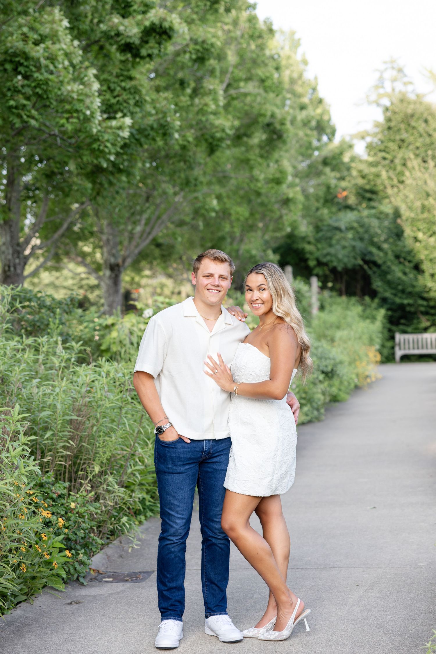 Romantic Ault Park engagement photos in Cincinnati, Ohio by Julia & Sean Photography, capturing a joyful couple during a golden hour engagem