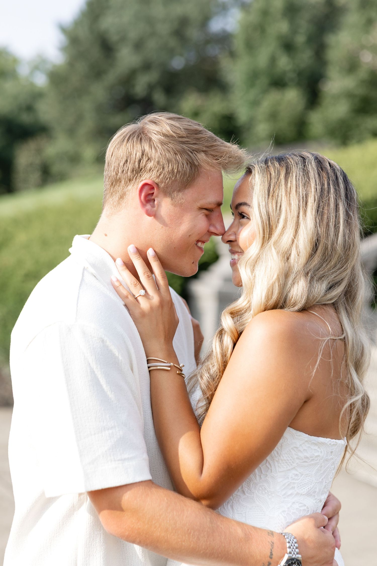 Romantic Ault Park engagement photos in Cincinnati, Ohio by Julia & Sean Photography, capturing a joyful couple during a golden hour engagem