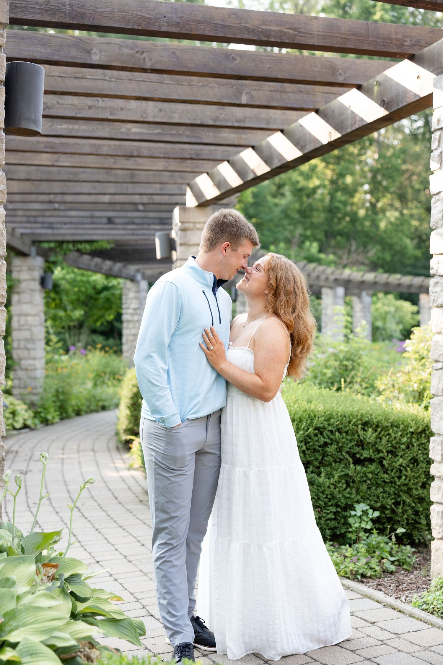 Engagement portraits at Wegerzyn Gardens engagement session, Dayton, Ohio captured by Ohio wedding photographers Julia and Sean Photography