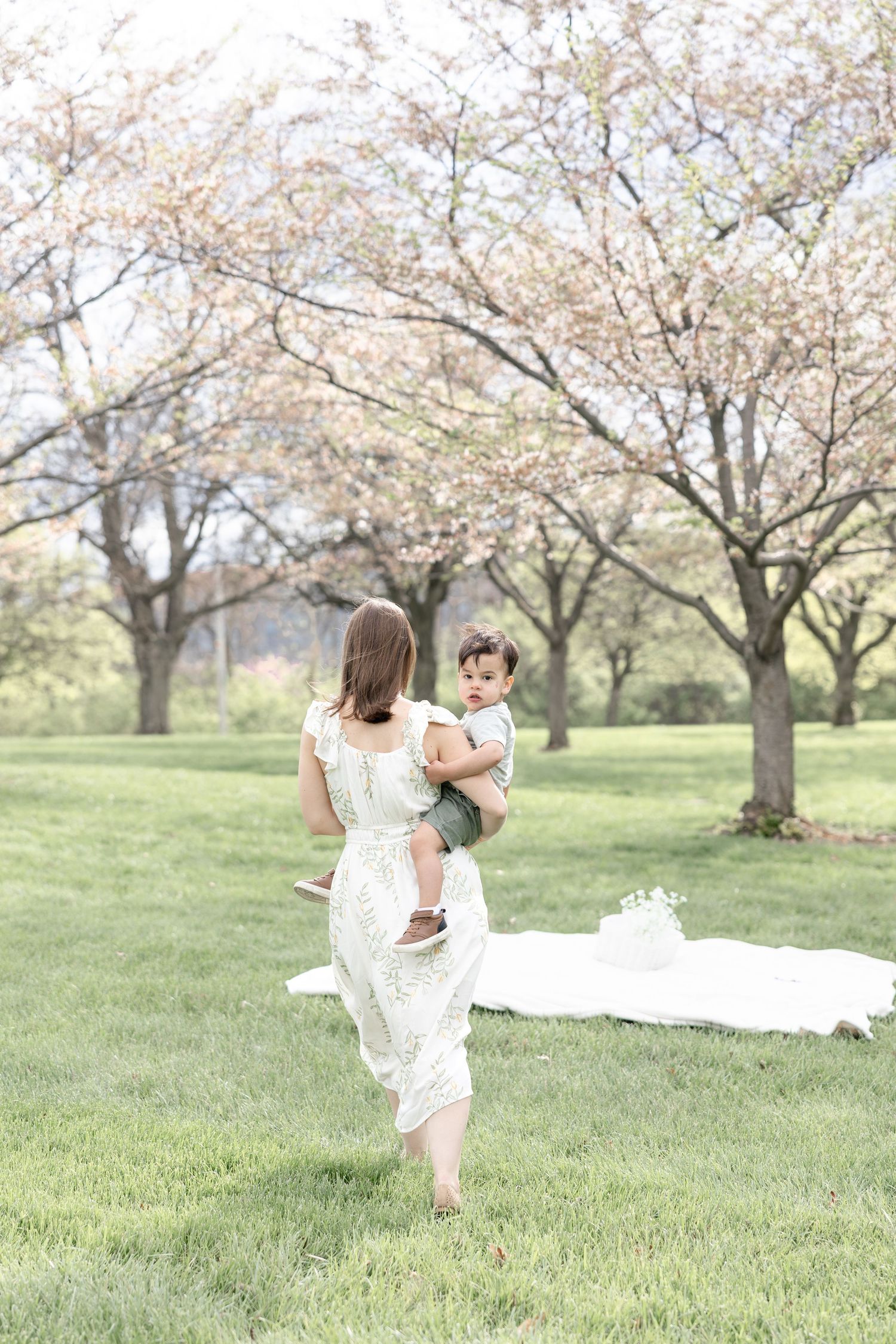 Joyful motherhood photos at Carillon Park in Dayton Ohio captured by Julia and Sean Photography during a soft spring day