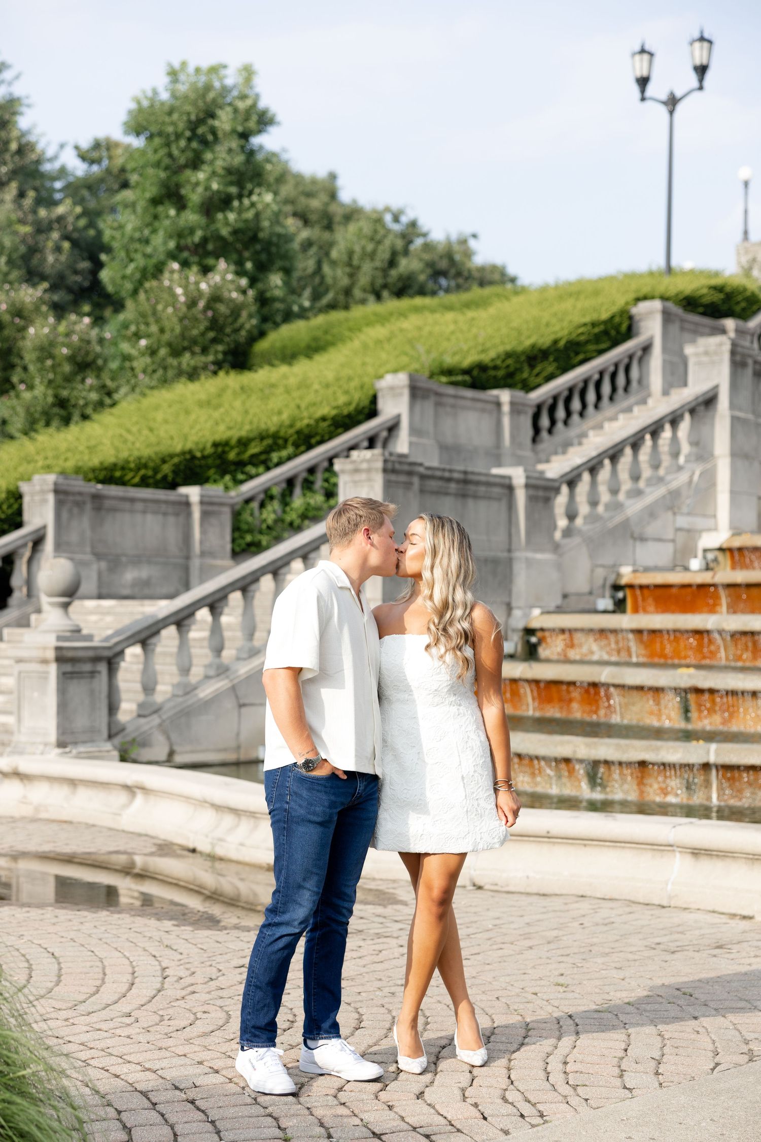 Romantic Ault Park engagement photos in Cincinnati, Ohio by Julia & Sean Photography, capturing a joyful couple during a golden hour engagem
