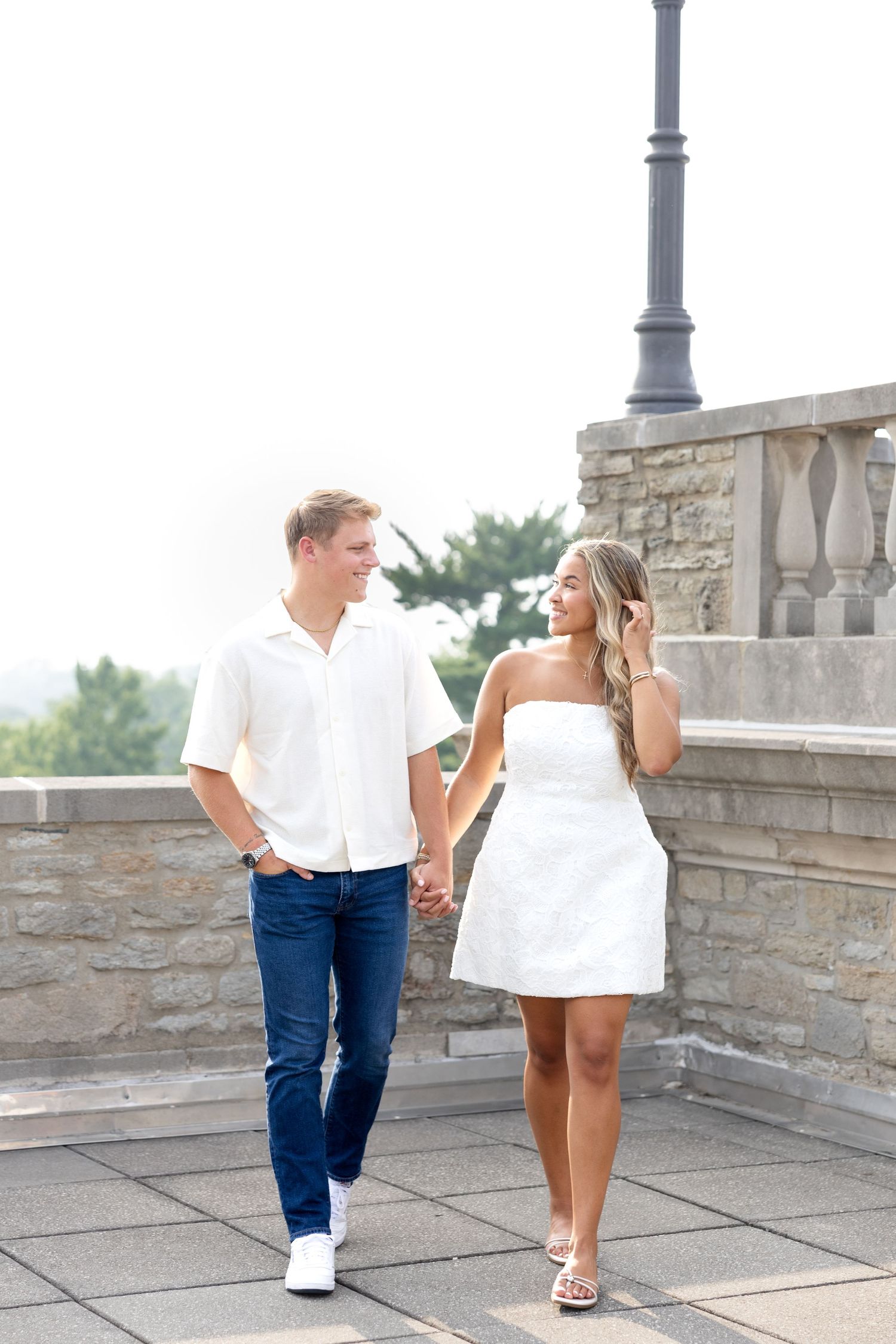 Romantic Ault Park engagement photos in Cincinnati, Ohio by Julia & Sean Photography, capturing a joyful couple during a golden hour engagem