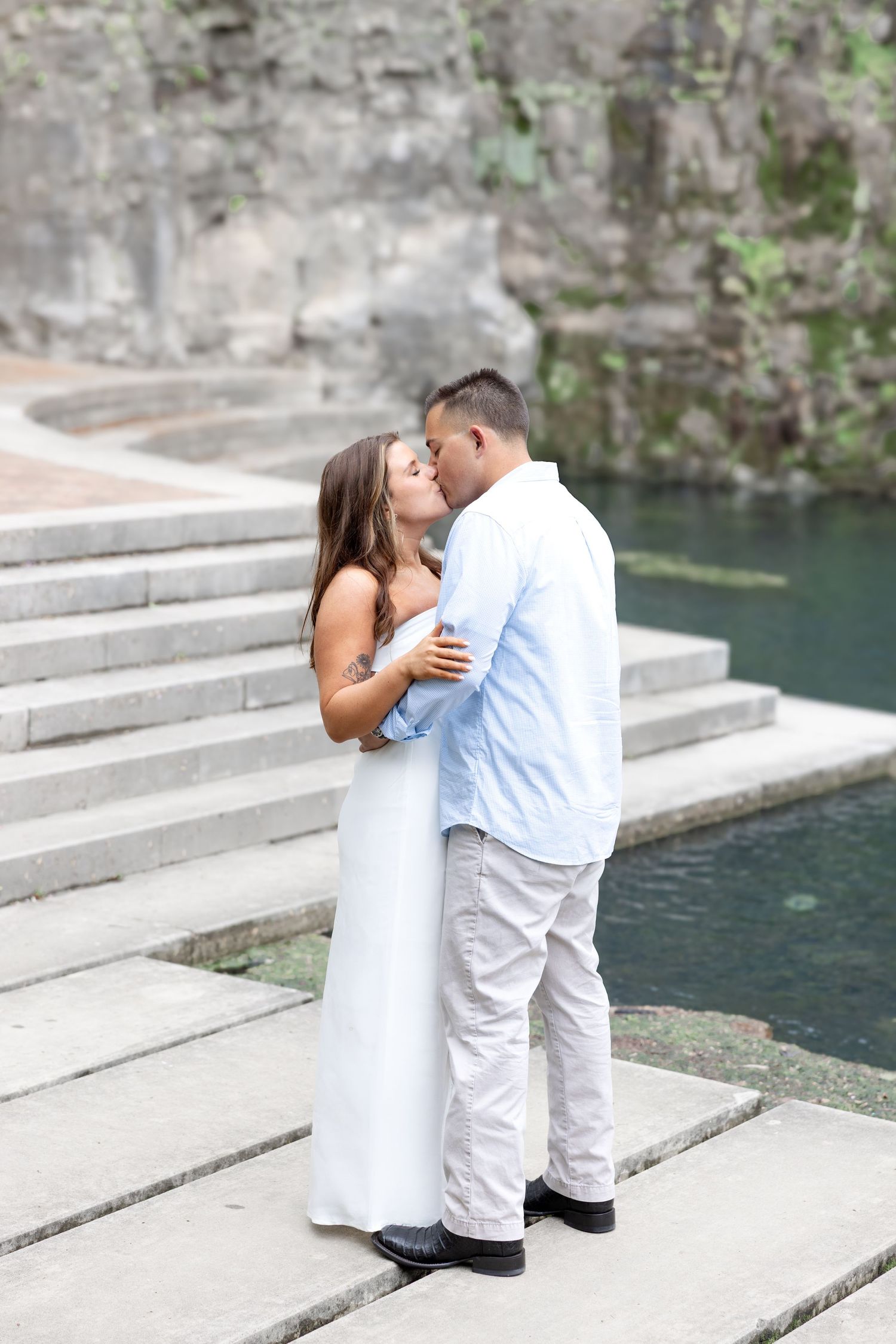 Downtown Huntsville engagement session at First National Bank and Big Spring Park by Julia and Sean Photography, capturing joyful moments.