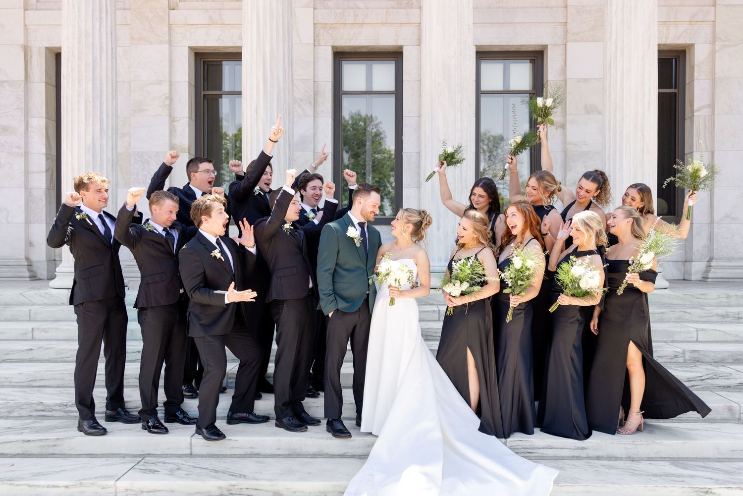 Bride and groom portraits at the Toledo Museum of Art before a Toledo Zoo wedding in Toledo, Ohio photographed by Julia & Sean Photography