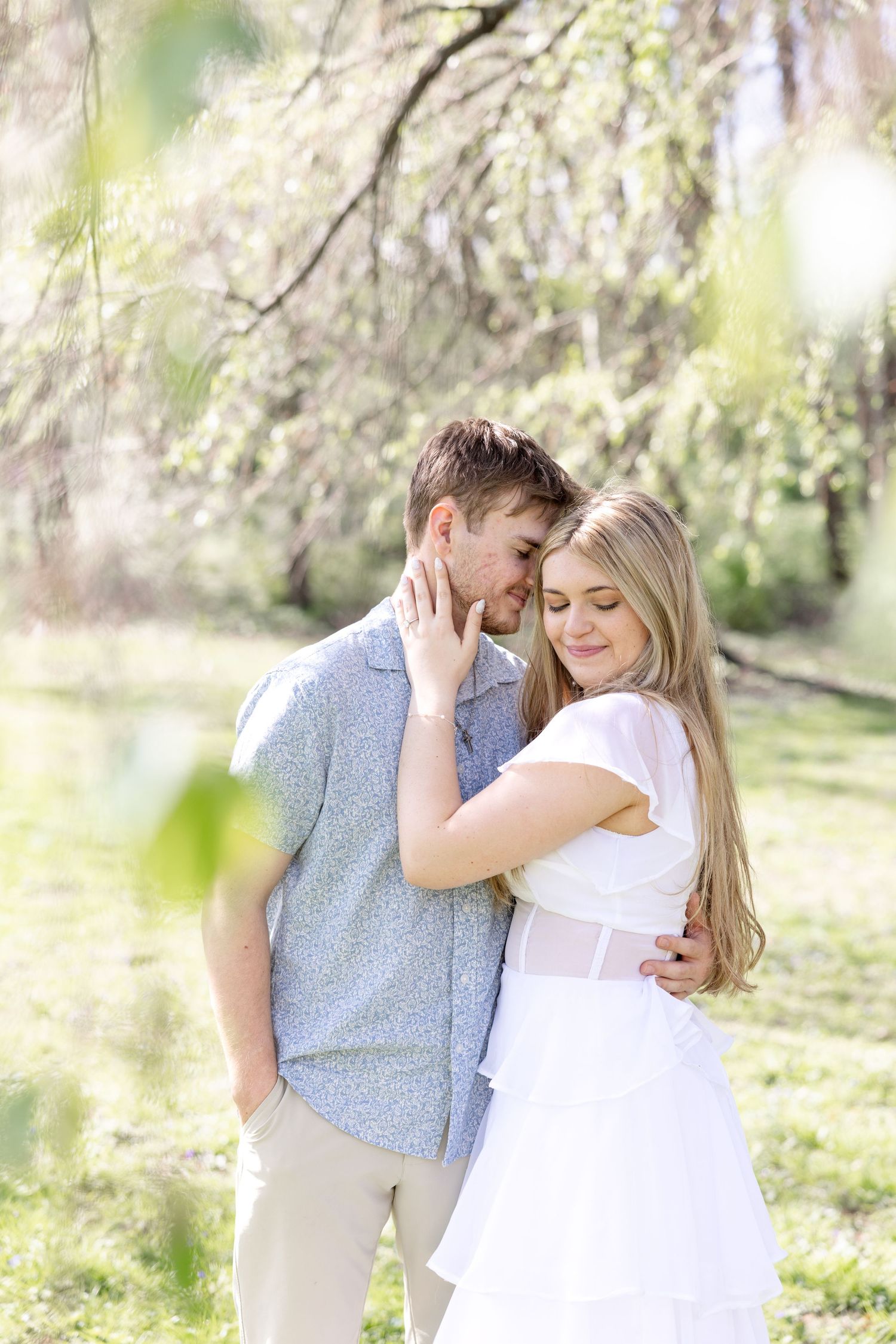 Cincinnati engagement session at Ault Park with light and airy style, capturing joyful, natural moments in a spring park setting