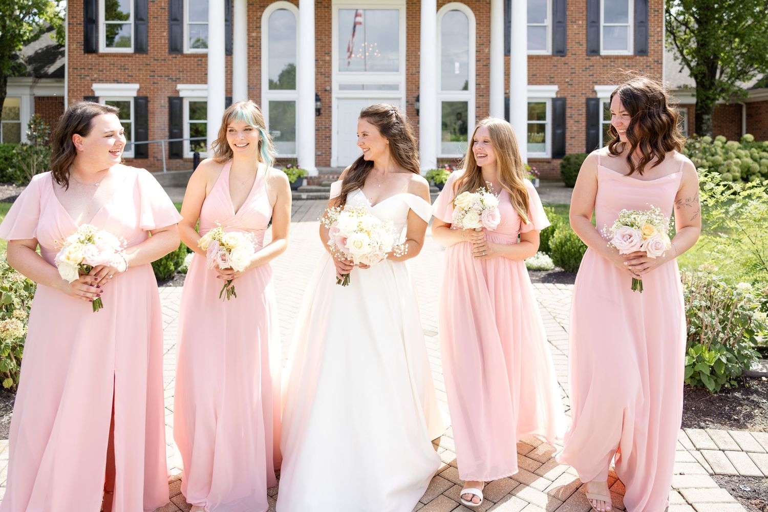 Light and airy wedding photography of a newly married couple at The Estate at Sunset Farm in Bellbrook, Ohio, by Julia and Sean Photography