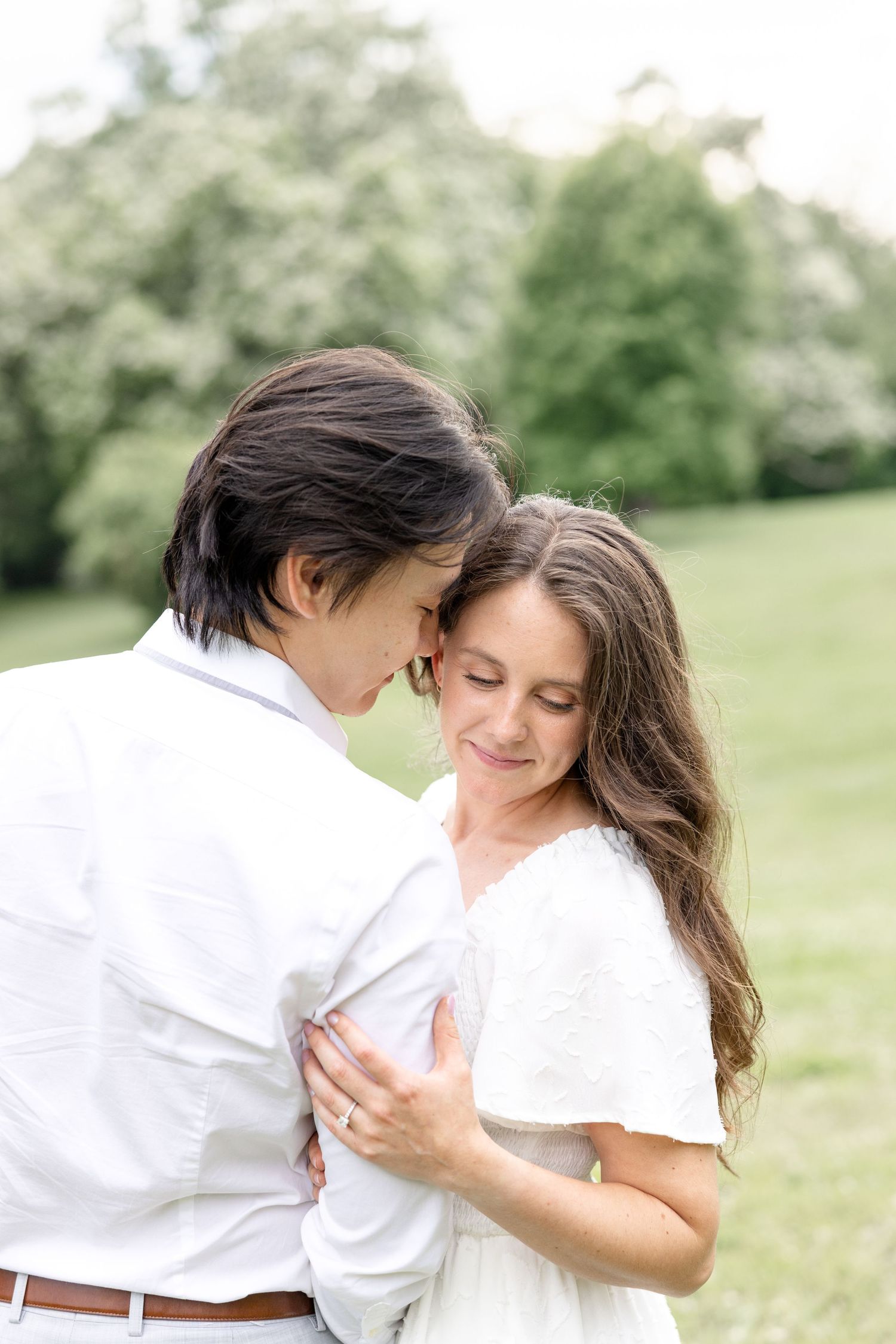 Romantic engagement photos at Mt. Echo Park overlooking the Cincinnati skyline in Cincinnati, Ohio by Julia and Sean Photography