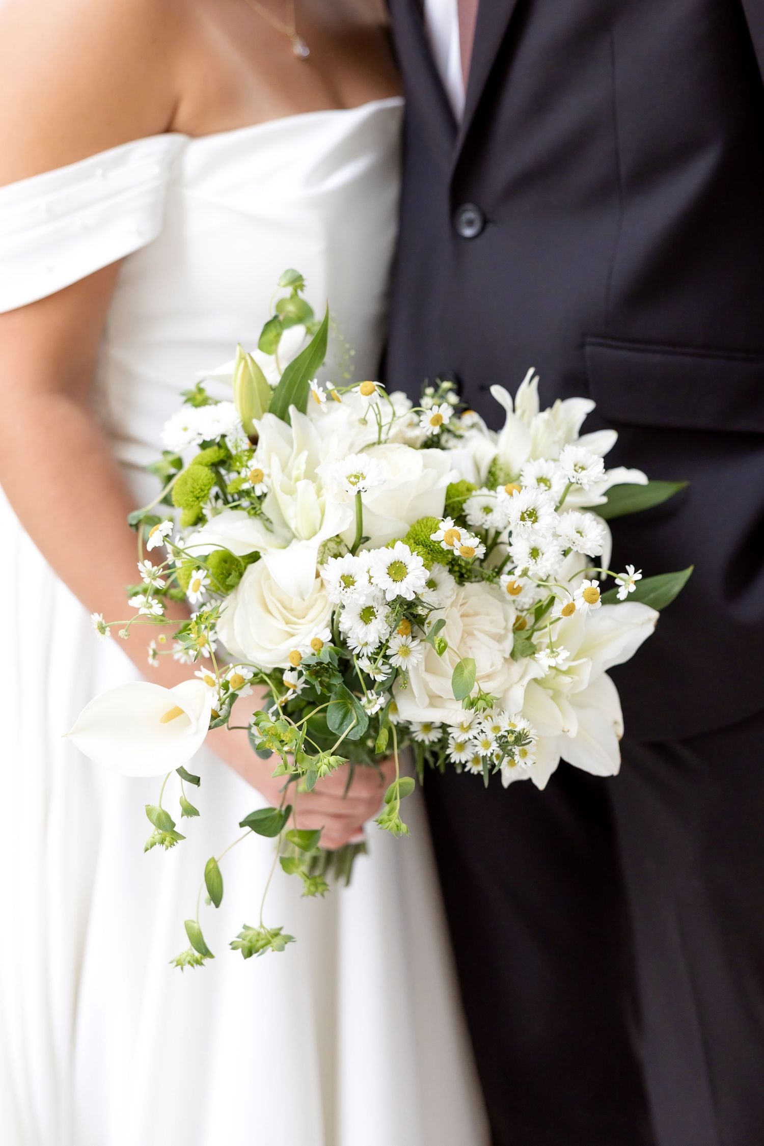 Bride and groom portraits at the Ohio Statehouse in downtown Columbus, Ohio, captured with timeless, light and airy wedding photography.
