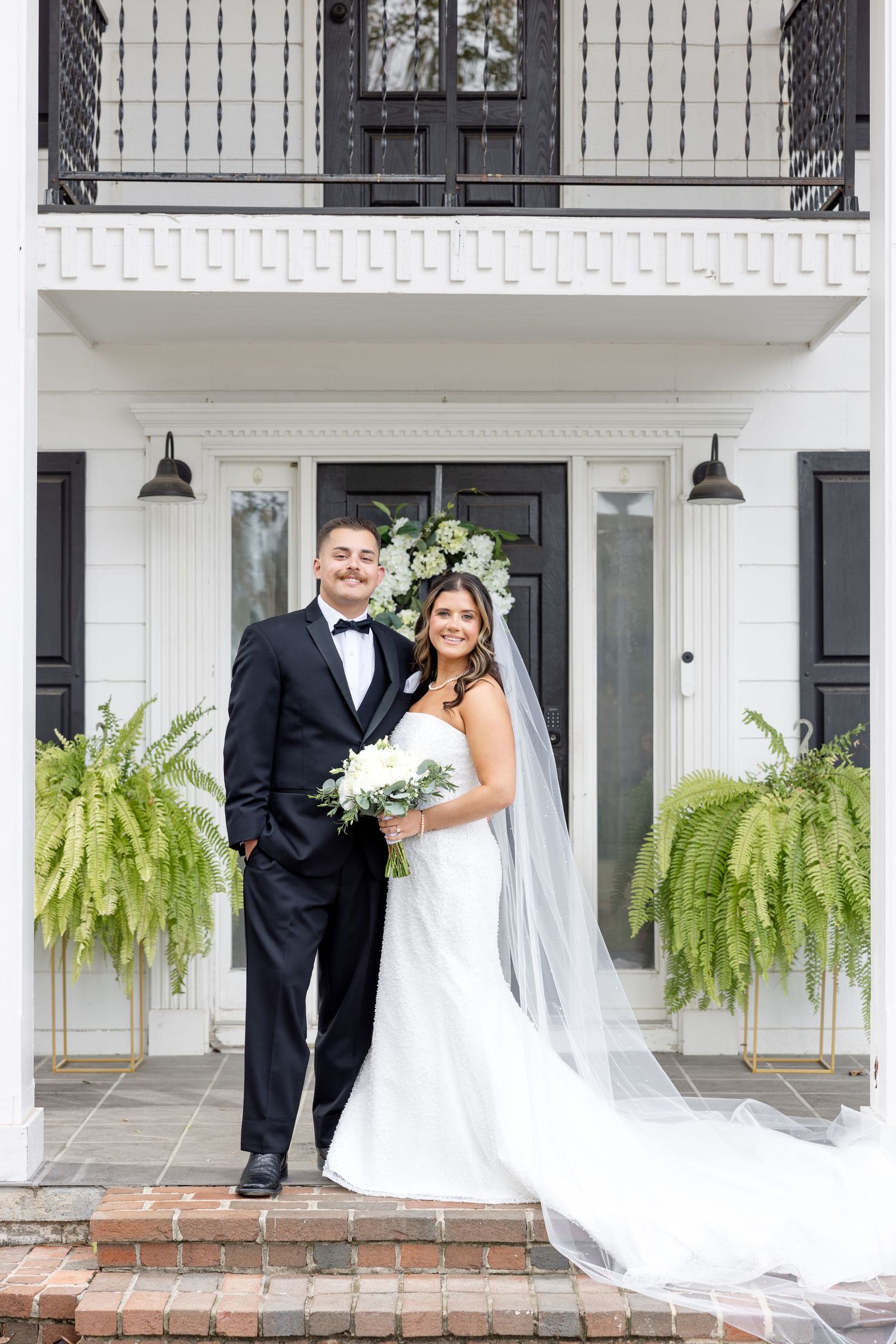 Elegant wedding at The Upton House in Guntersville, Alabama featuring a joyful bride and groom and timeless southern elegance.