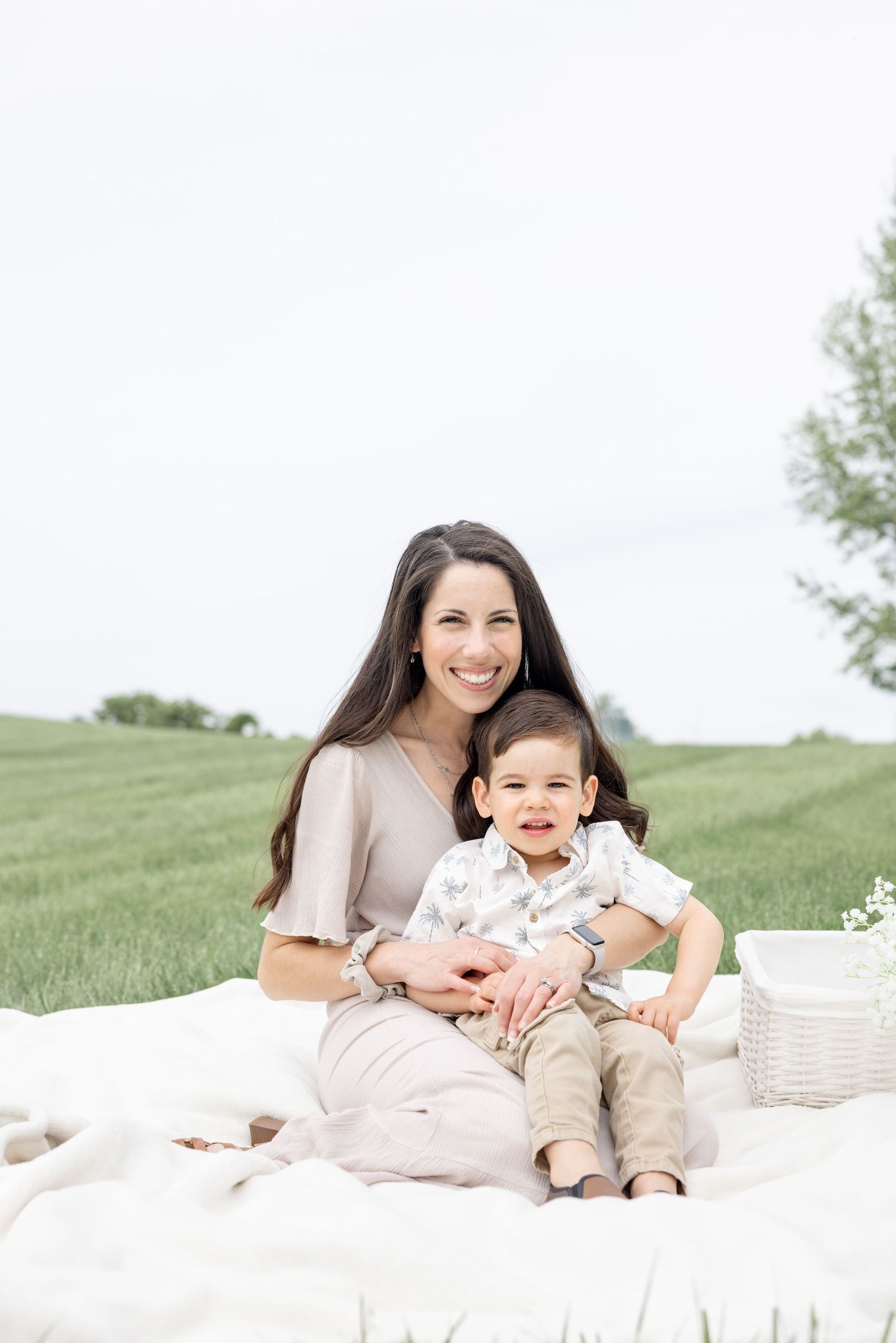 Mother holding her baby during a timeless motherhood session at Carillon Park in Dayton Ohio with Julia and Sean Photography