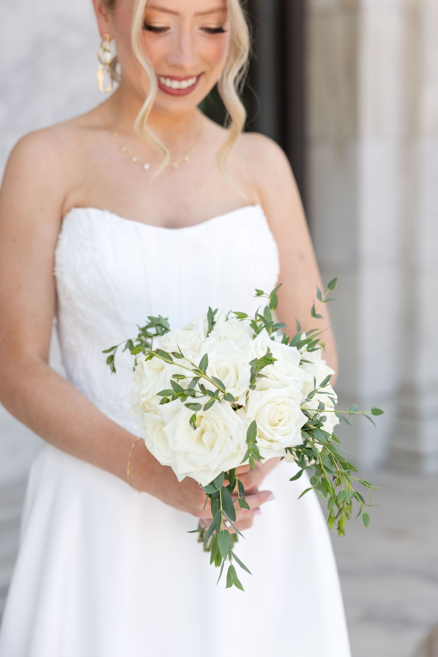 Bride and groom portraits at the Toledo Museum of Art before a Toledo Zoo wedding in Toledo, Ohio photographed by Julia & Sean Photography