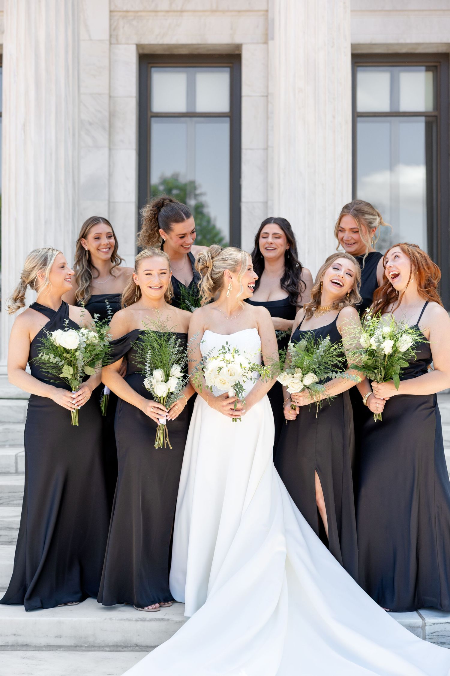 Bride and groom portraits at the Toledo Museum of Art before a Toledo Zoo wedding in Toledo, Ohio photographed by Julia & Sean Photography