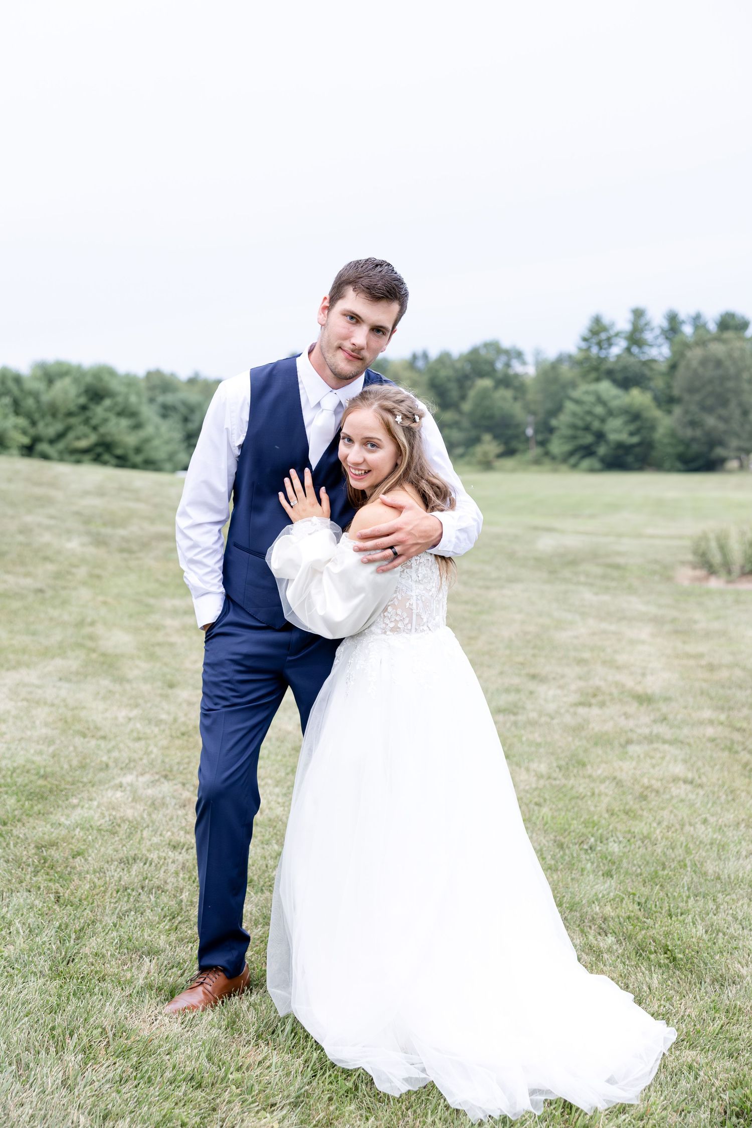 Romantic summer wedding in Northeast Ohio at Heartland on Heritage by Julia and Sean Photography, husband-and-wife wedding photographers.