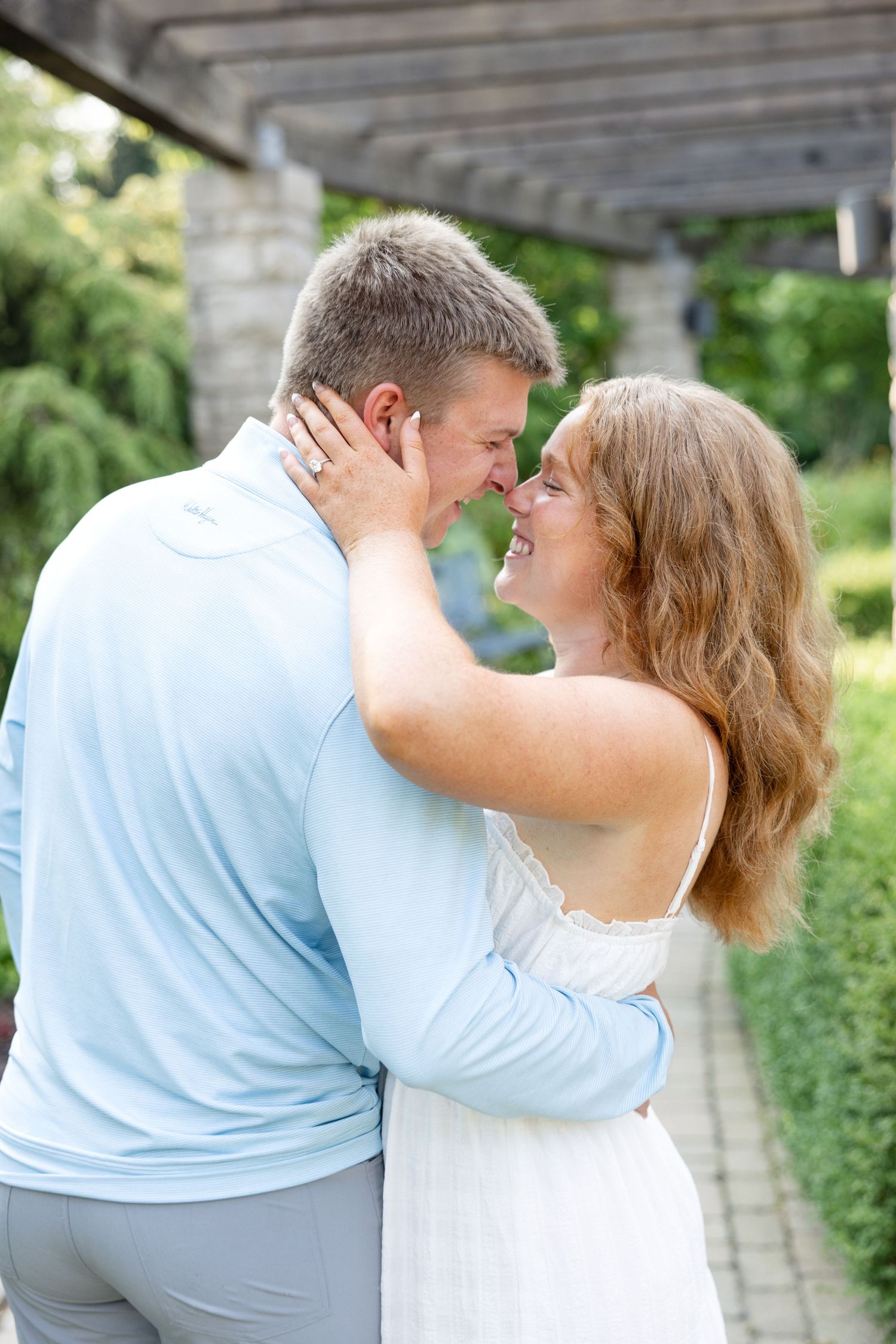 Engagement portraits at Wegerzyn Gardens engagement session, Dayton, Ohio captured by Ohio wedding photographers Julia and Sean Photography