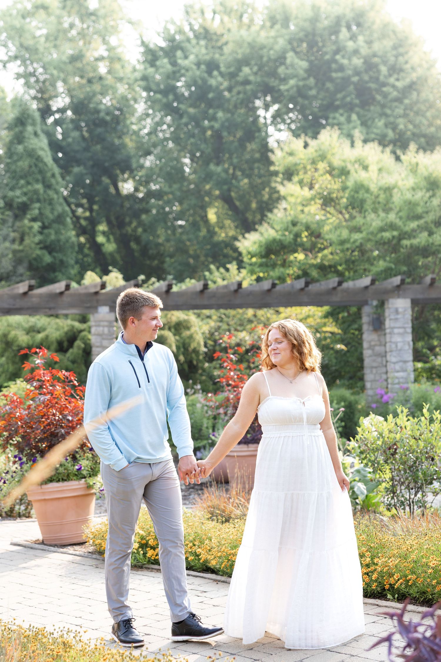 Engagement portraits at Wegerzyn Gardens engagement session, Dayton, Ohio captured by Ohio wedding photographers Julia and Sean Photography