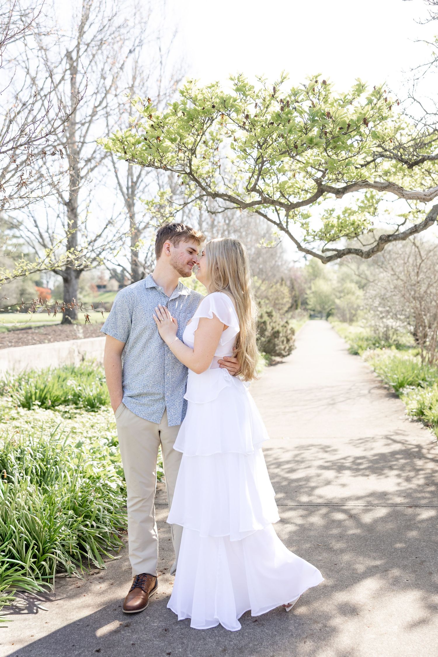 Cincinnati engagement session at Ault Park with light and airy style, capturing joyful, natural moments in a spring park setting