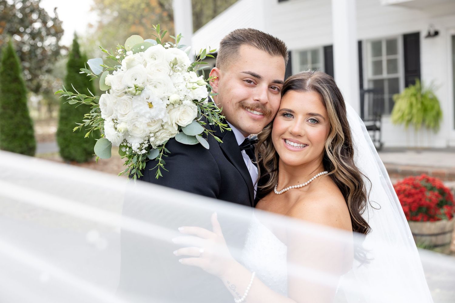 Elegant wedding at The Upton House in Guntersville, Alabama featuring a joyful bride and groom and timeless southern elegance.