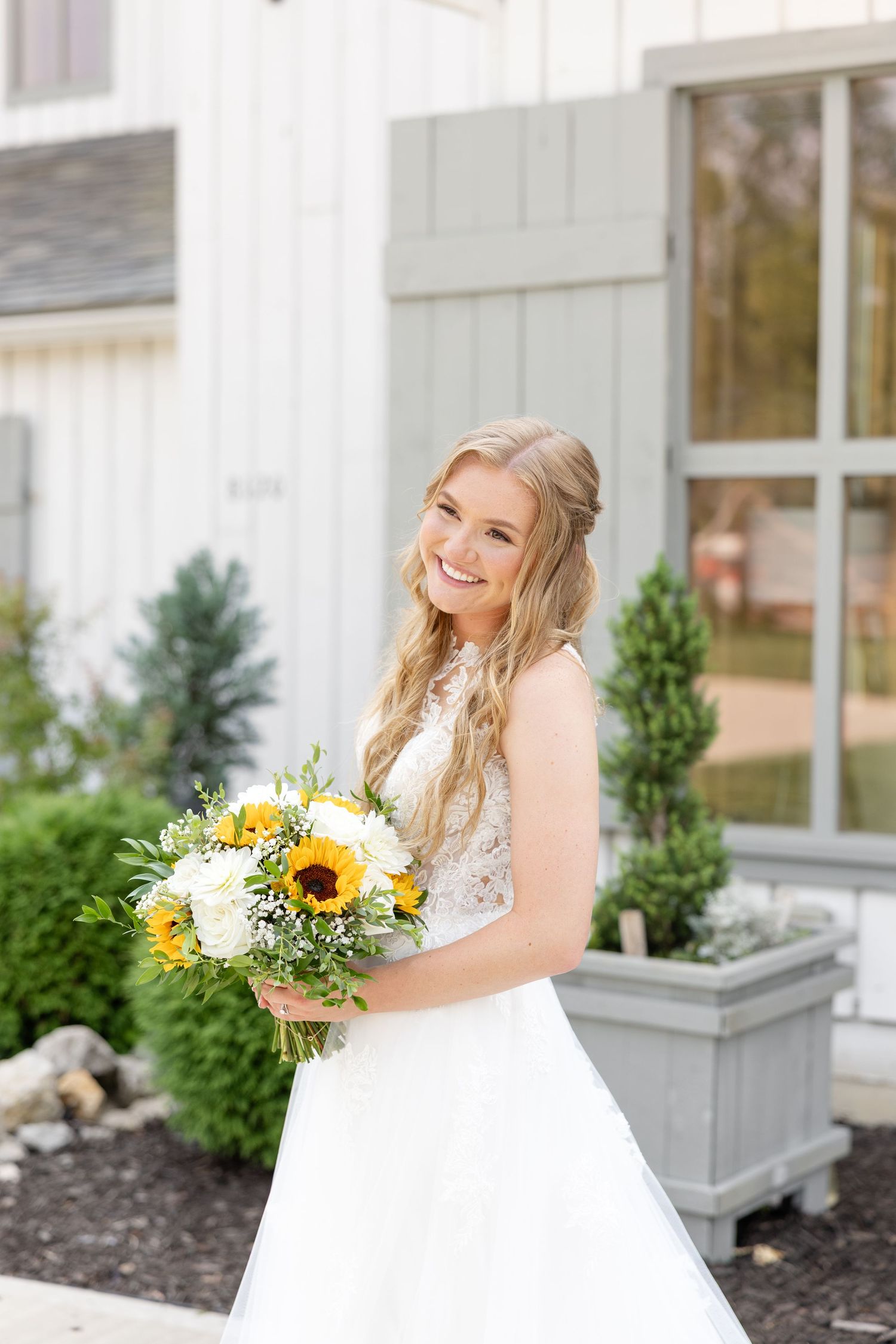 Timeless wedding photography at The Bicentennial Barn in Dayton, Ohio, featuring a joyful Cedarville University couple on their wedding day.
