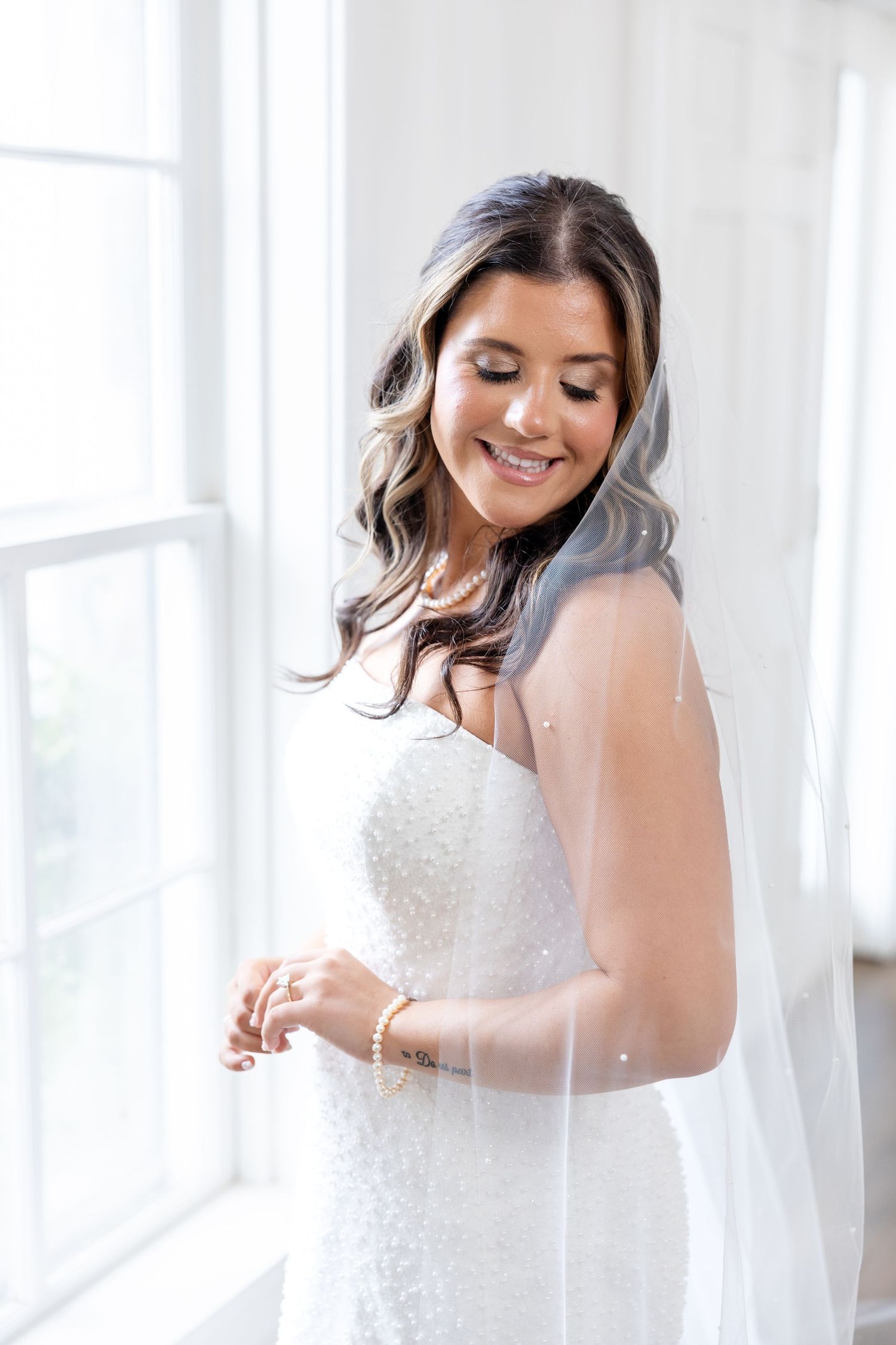 Elegant wedding at The Upton House in Guntersville, Alabama featuring a joyful bride and groom and timeless southern elegance.