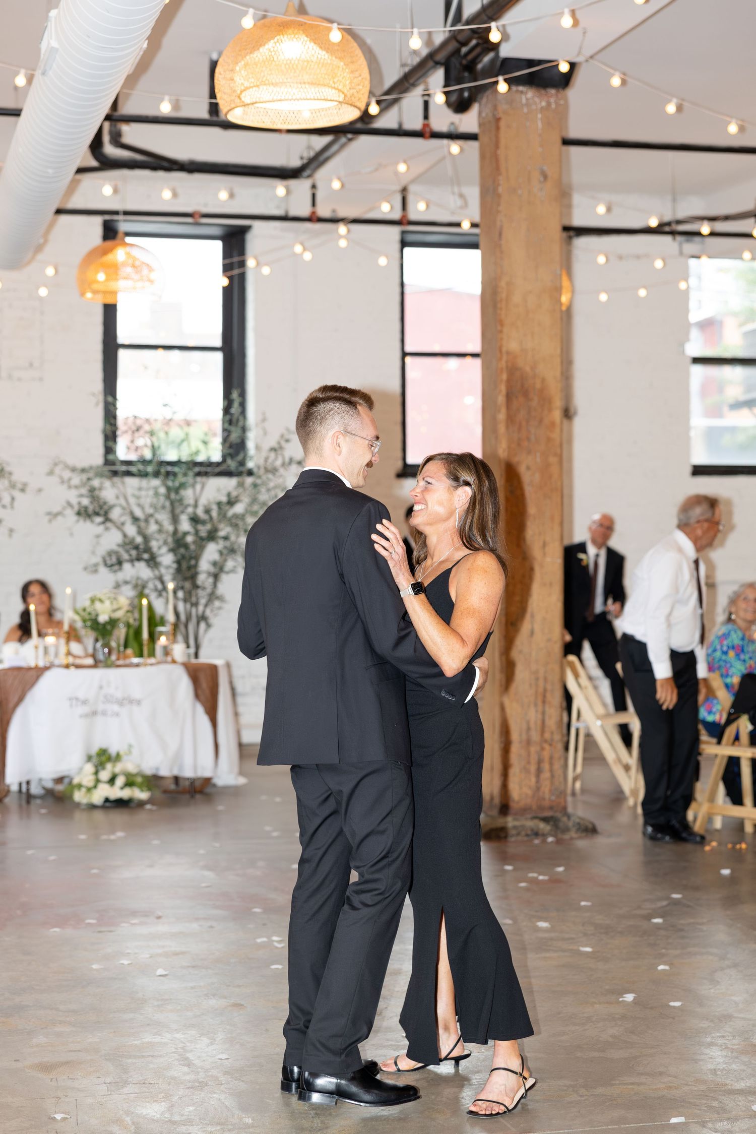 Wedding reception at Flat 51 in downtown Columbus, Ohio, featuring elegant reception details, heartfelt moments, and joyful celebration.