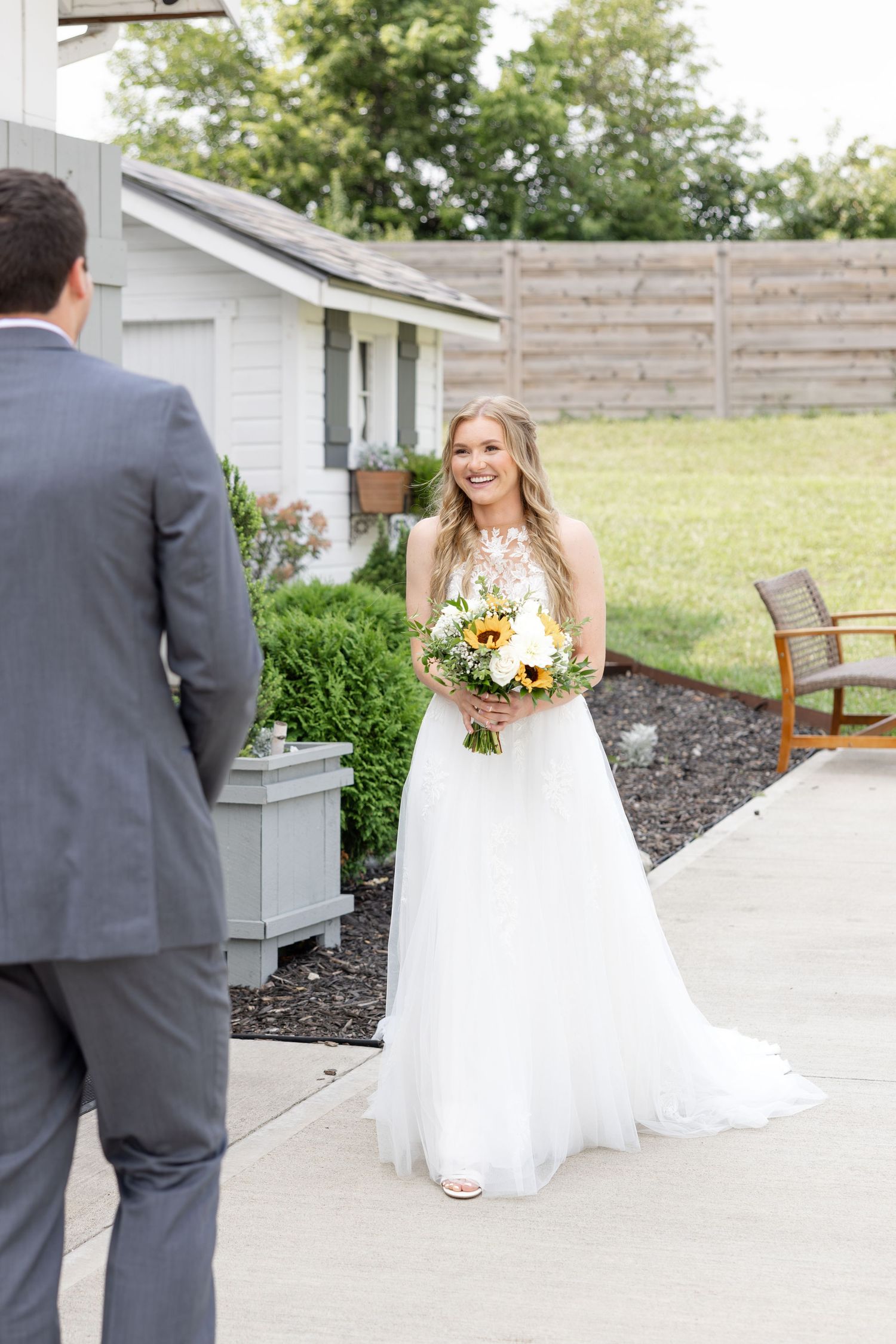 Timeless wedding photography at The Bicentennial Barn in Dayton, Ohio, featuring a joyful Cedarville University couple on their wedding day.