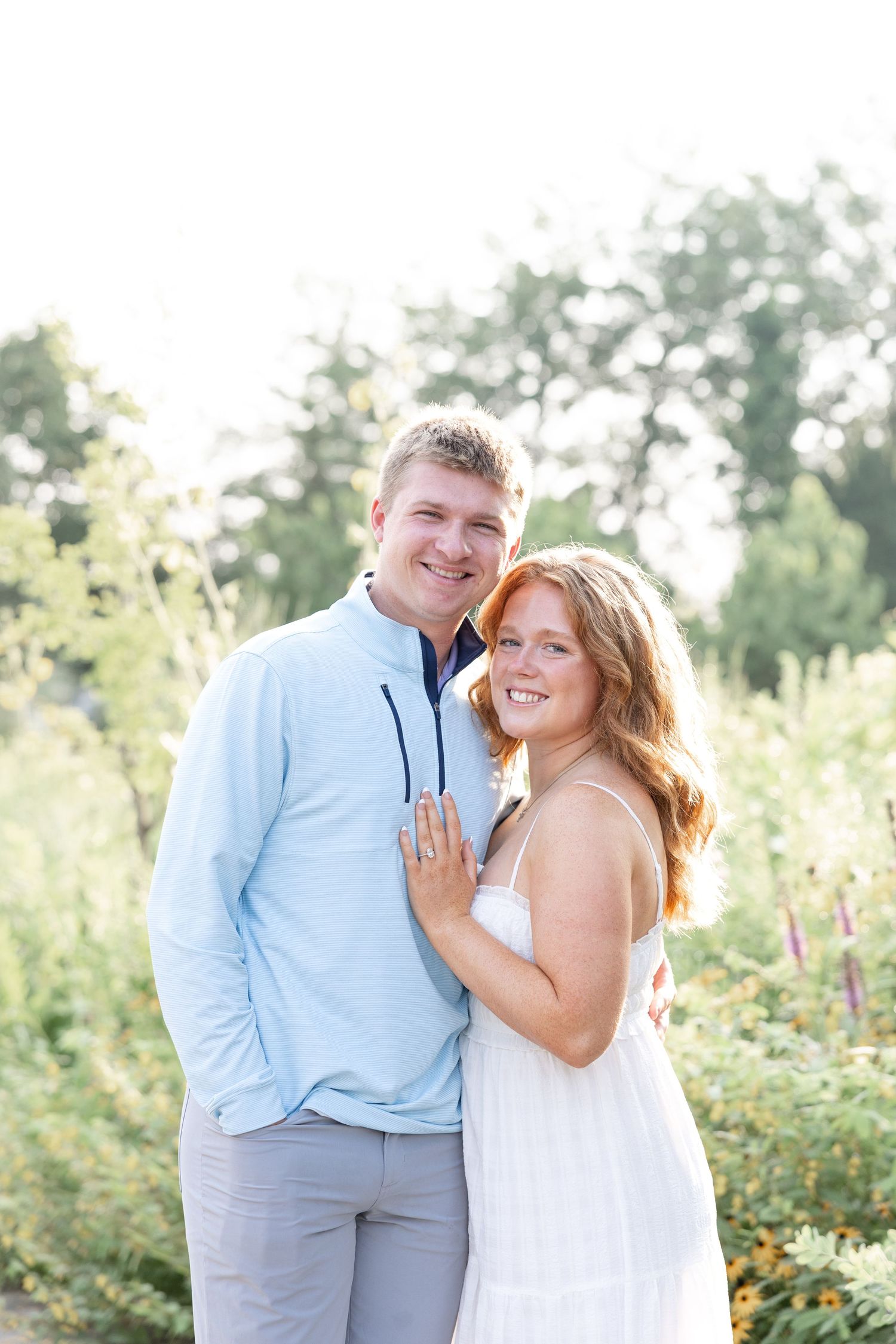 Wegerzyn Gardens engagement session in Dayton, Ohio featuring a joyful couple enjoying soft morning light and timeless engagement photos.