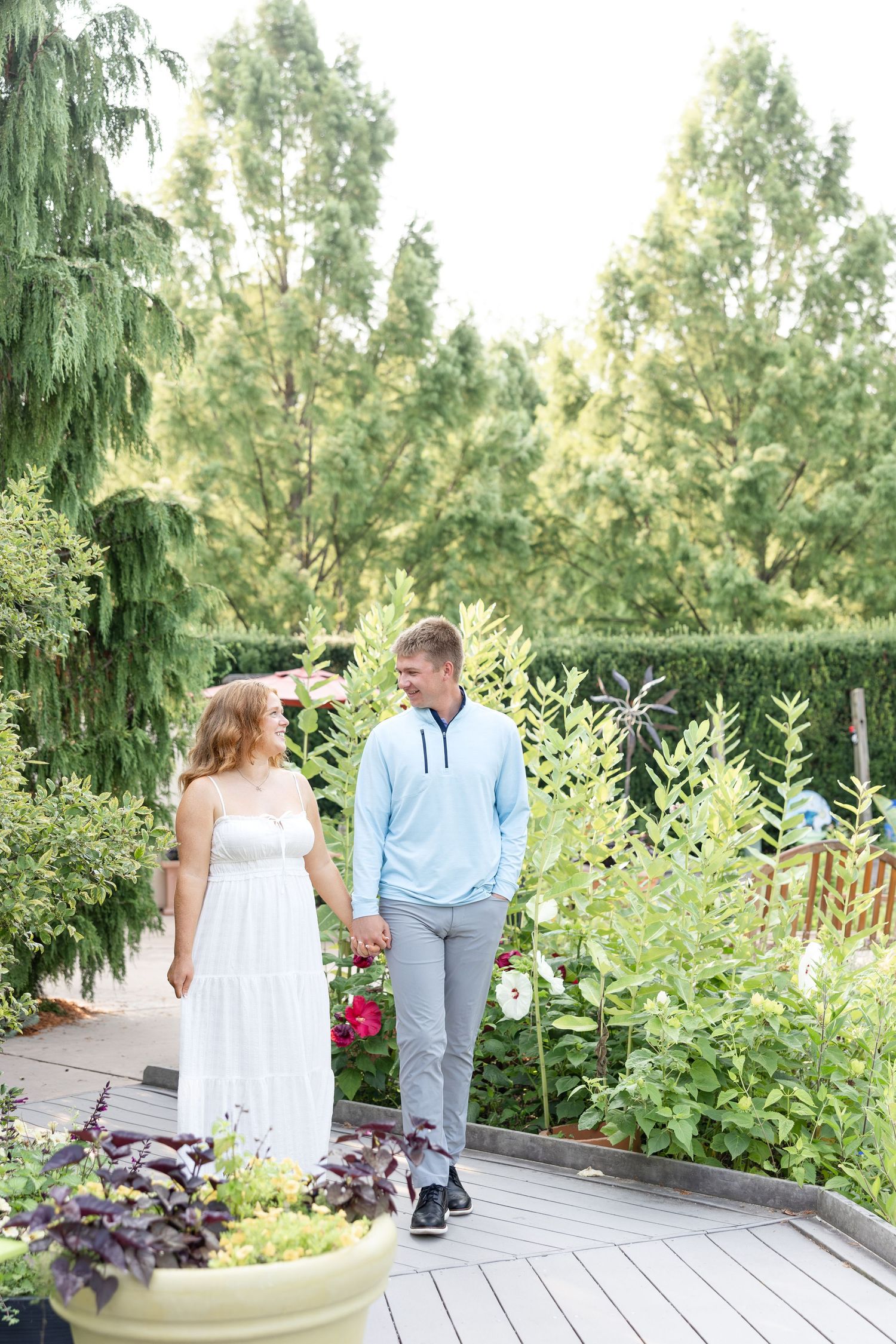 Joyful engagement photos at Wegerzyn Gardens captured by a Dayton engagement photographer with beautiful gardens and natural morning light.