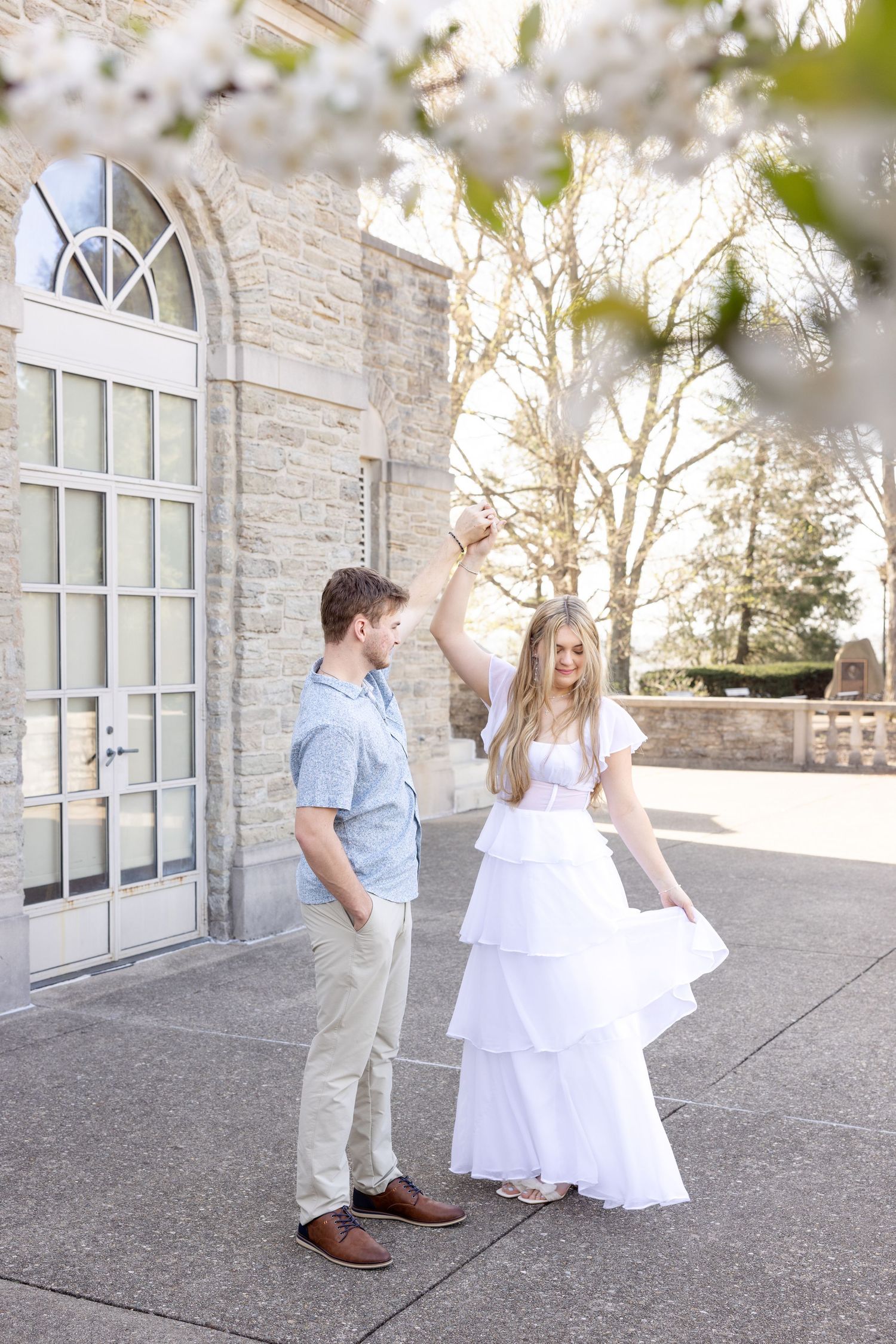 Cincinnati engagement session at Ault Park with light and airy style, capturing joyful, natural moments in a spring park setting