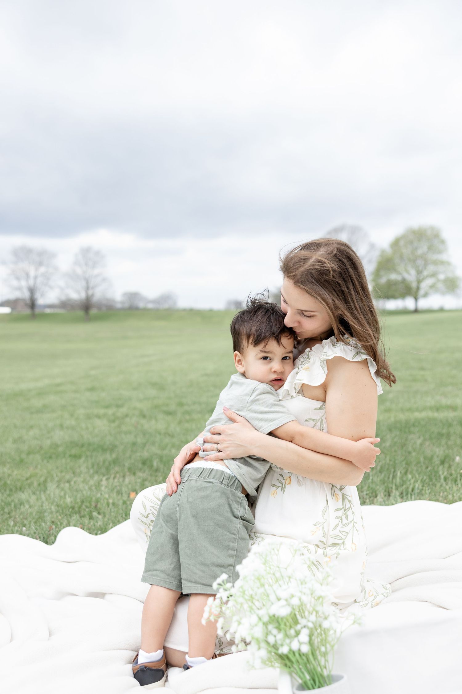 Joyful motherhood photos at Carillon Park in Dayton Ohio captured by Julia and Sean Photography during a soft spring day