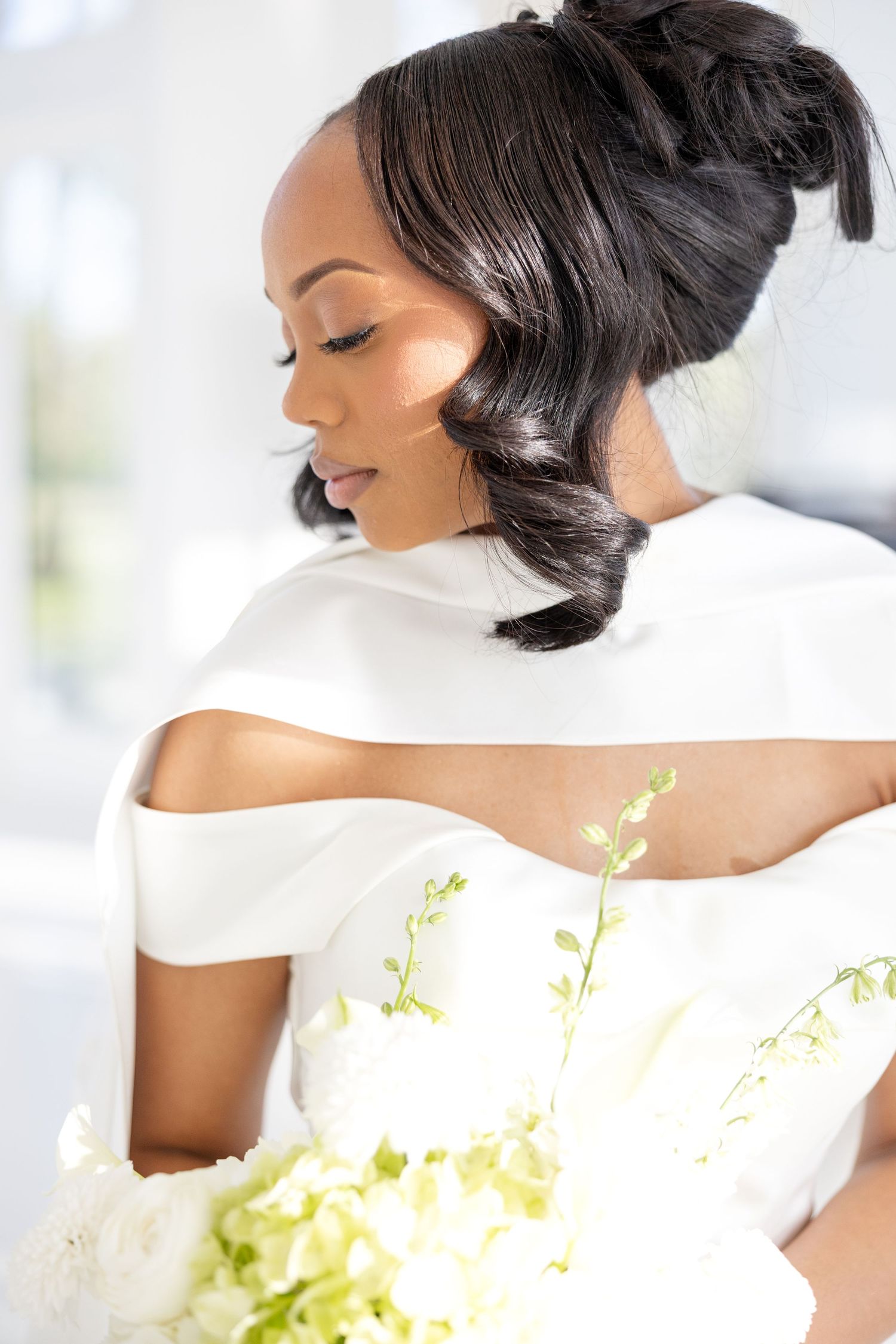 Light and airy wedding photos at The Glass House near Huntsville, Alabama capturing joyful, timeless moments of a bride and groom