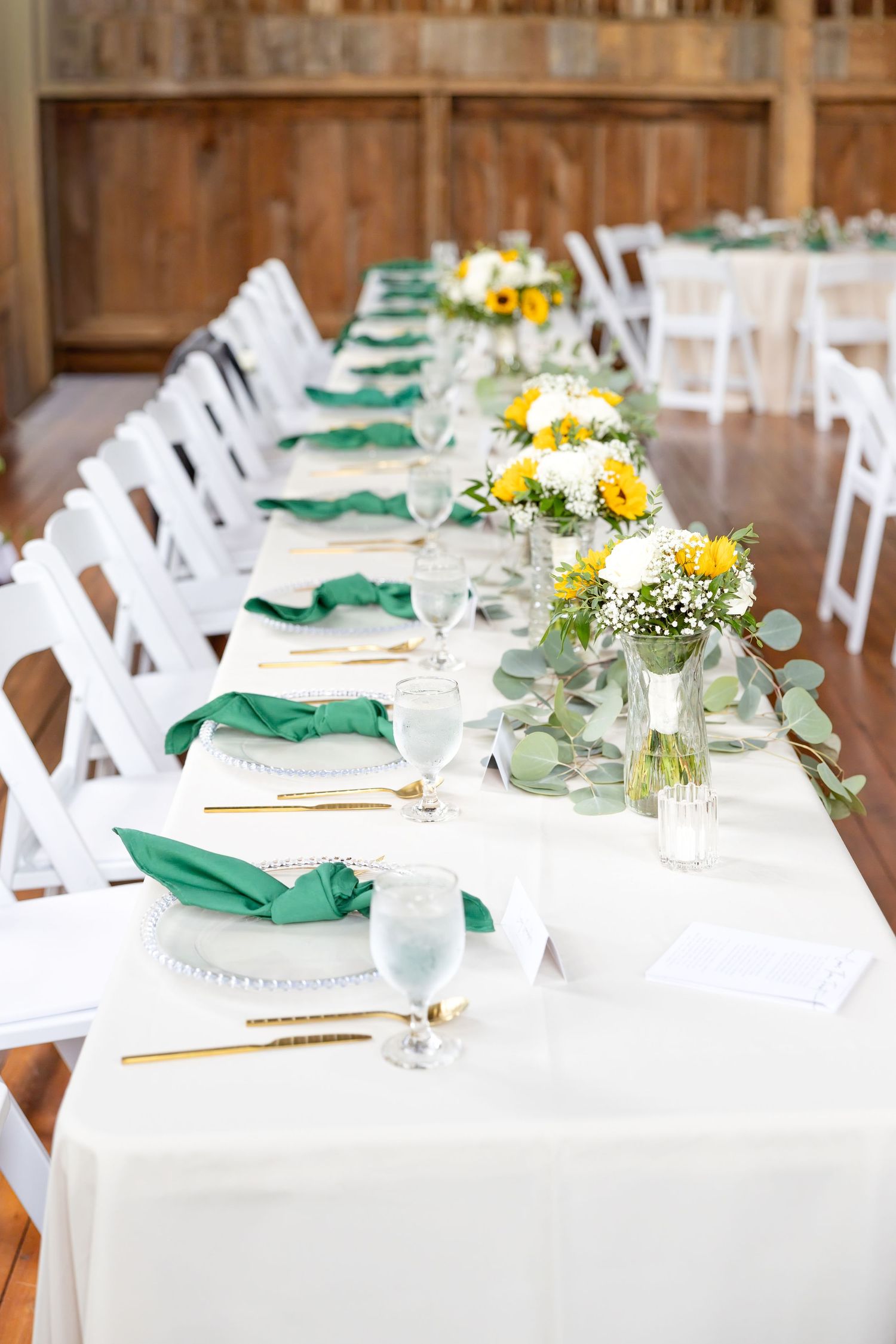 Joyful summer wedding at The Bicentennial Barn in Dayton, Ohio, photographed by Dayton wedding photographers Julia and Sean Photography.
