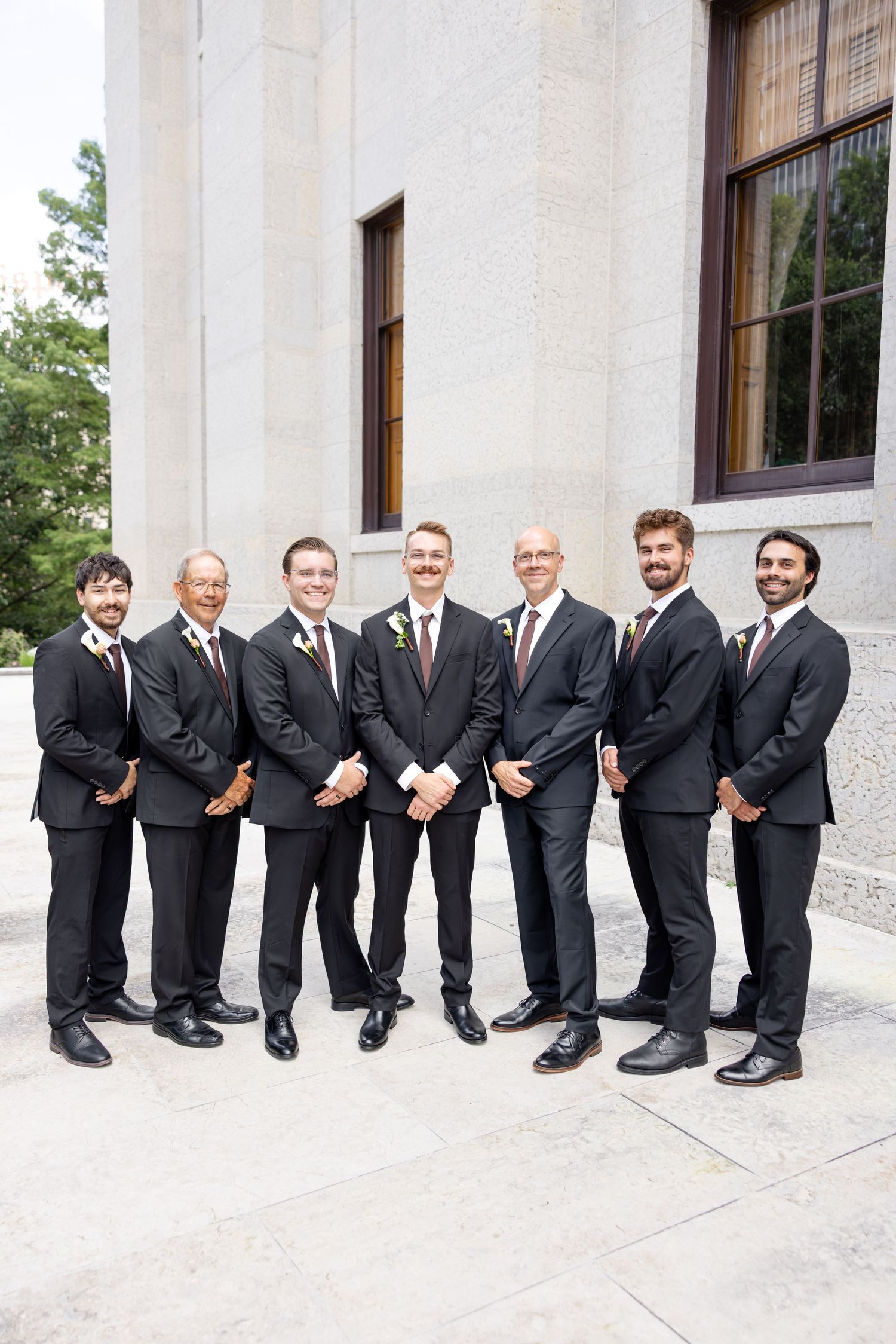 Bride and groom celebrating their Flat 51 wedding in downtown Columbus, Ohio, captured with timeless, light and airy wedding photography.