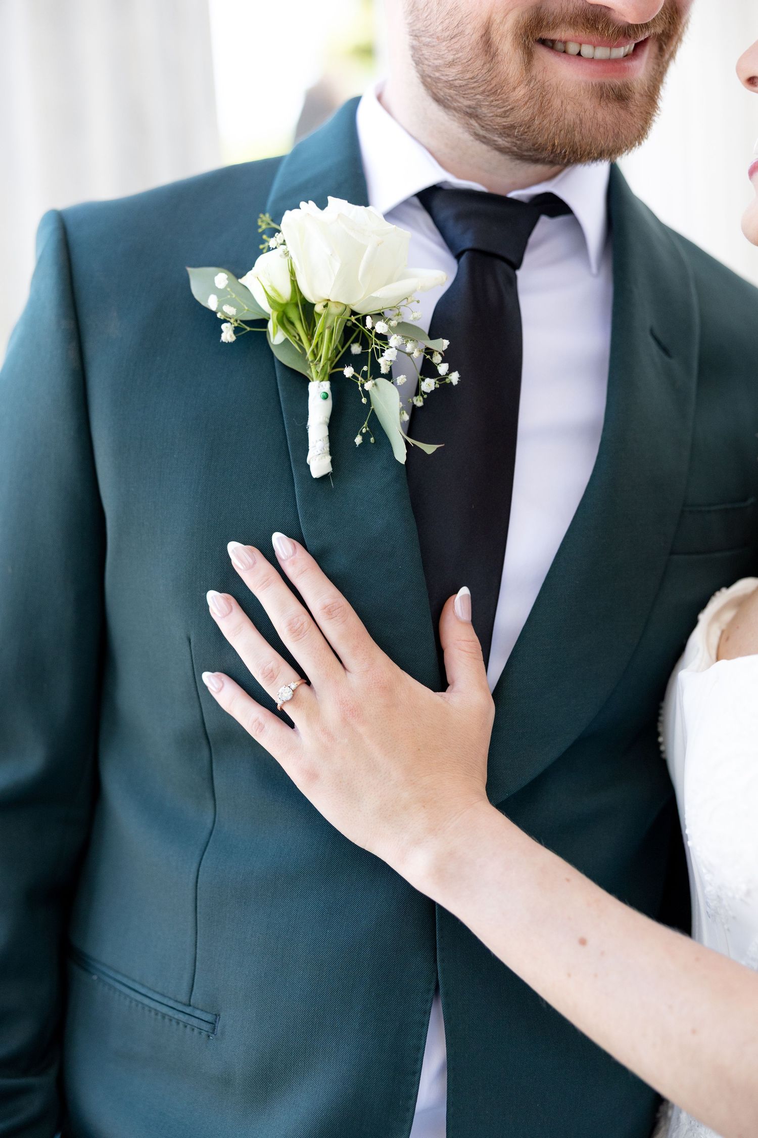 Bride and groom portraits at the Toledo Museum of Art before a Toledo Zoo wedding in Toledo, Ohio photographed by Julia & Sean Photography