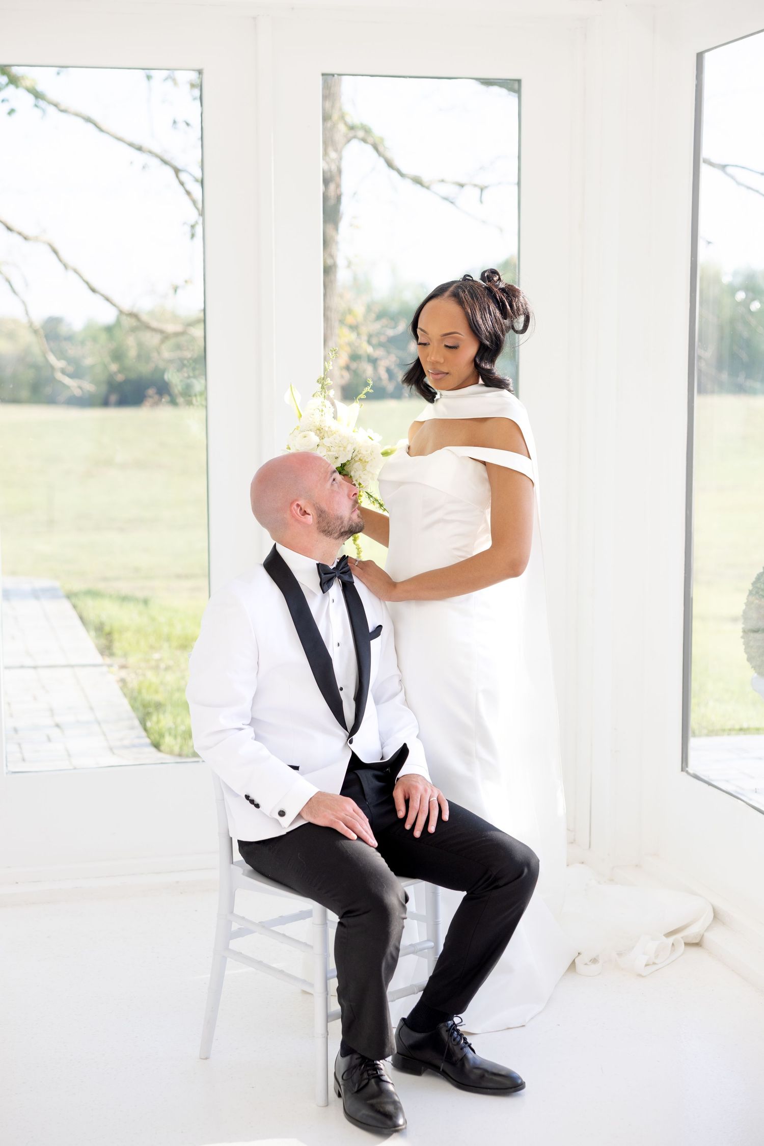Light and airy wedding photos at The Glass House near Huntsville, Alabama capturing joyful, timeless moments of a bride and groom
