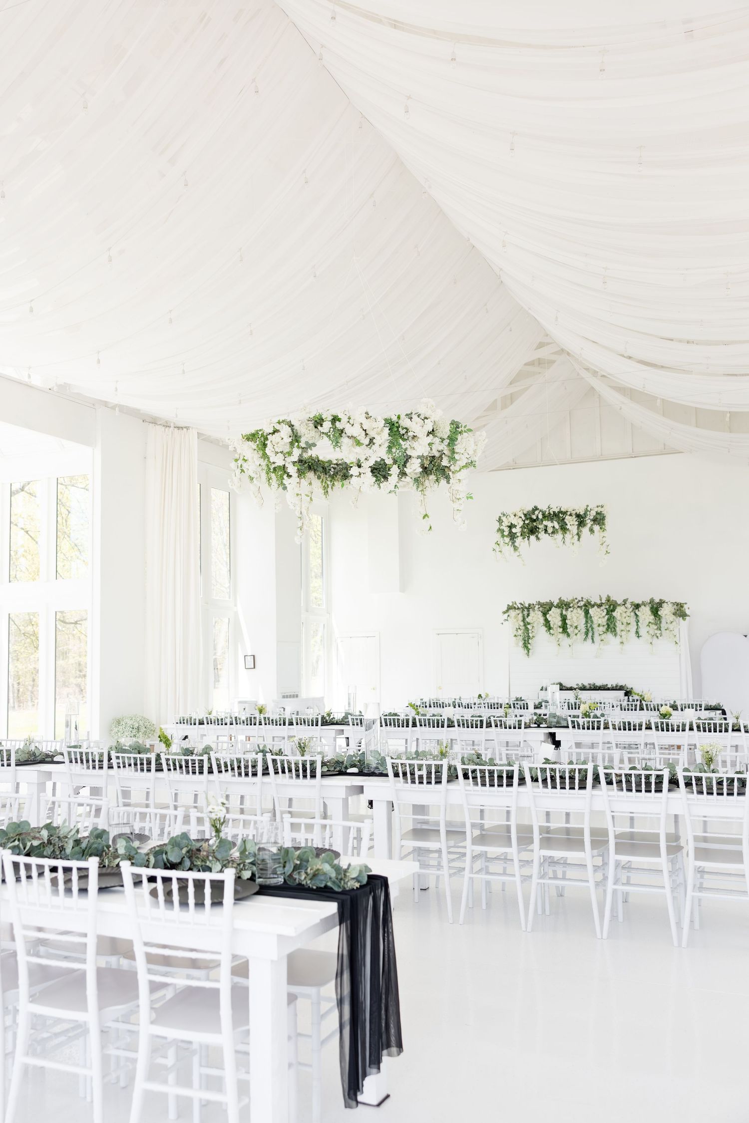 Light and airy wedding photos at The Glass House near Huntsville, Alabama capturing joyful, timeless moments of a bride and groom