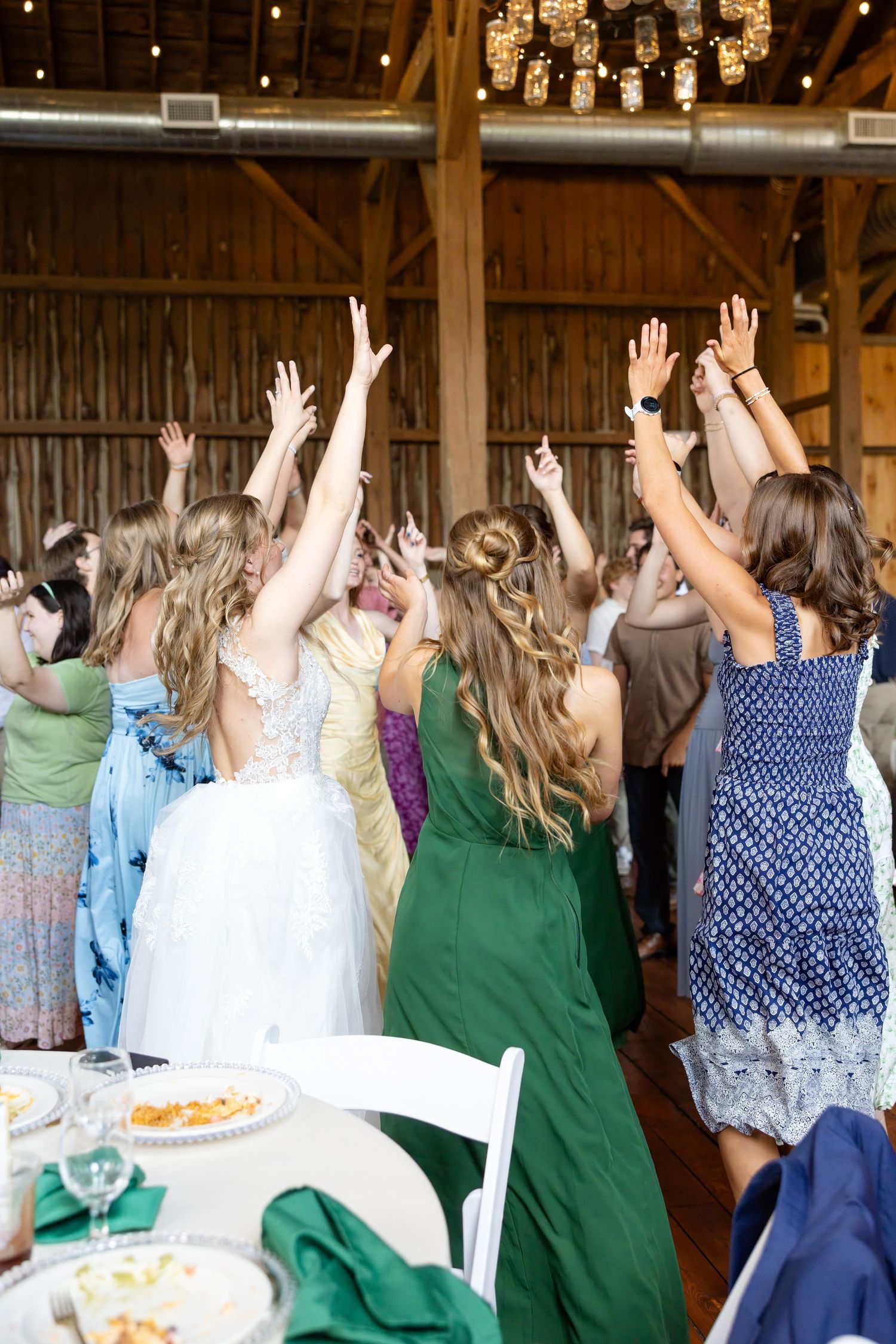 Joyful summer wedding at The Bicentennial Barn in Dayton, Ohio, photographed by Dayton wedding photographers Julia and Sean Photography.